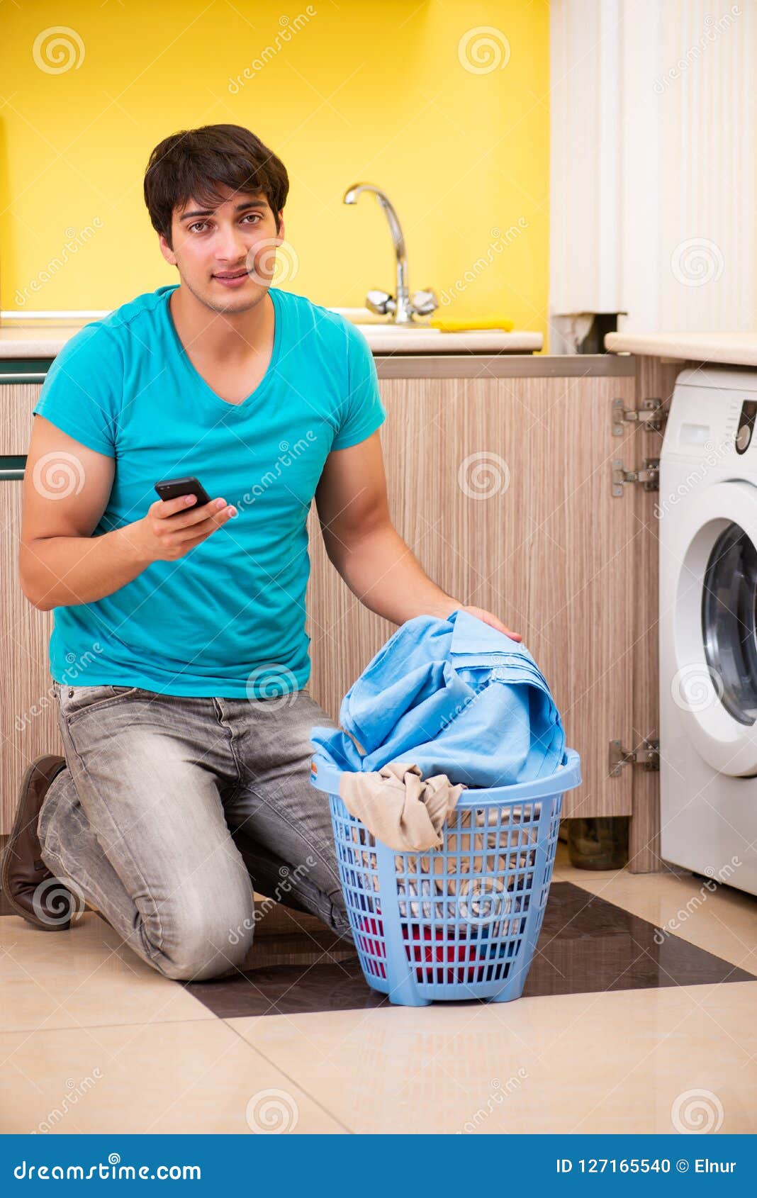 The Young Husband Man Doing Laundry at Home Stock Photo Image of