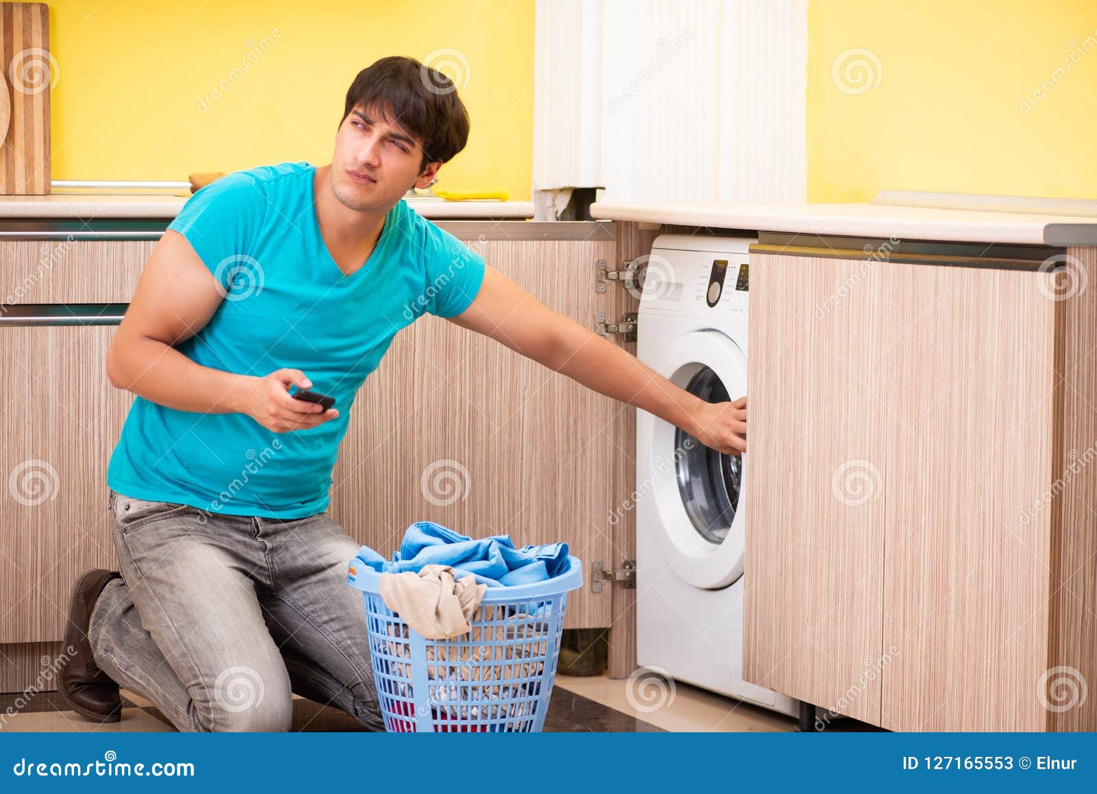 The Young Husband Man Doing Laundry at Home Stock Image Image of