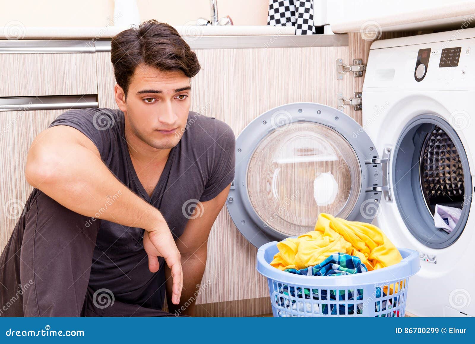 The Young Husband Man Doing Laundry at Home Stock Image Image of