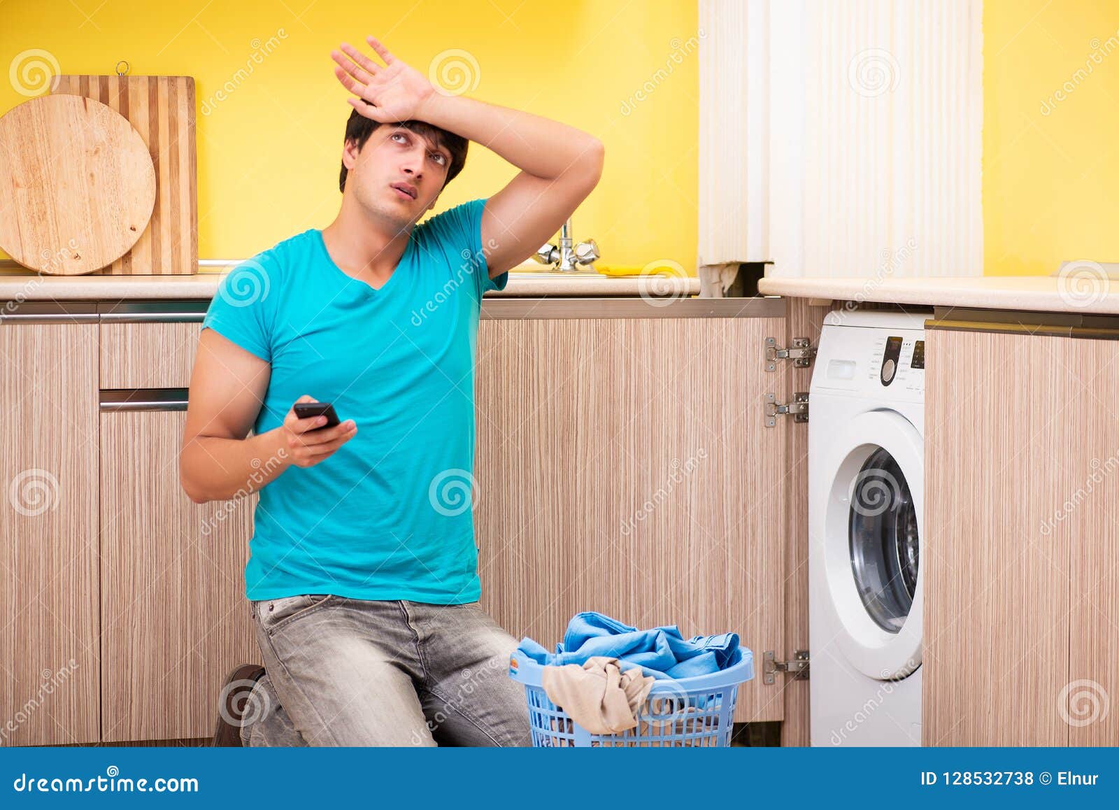 The Young Husband Man Doing Laundry at Home Stock Photo Image of