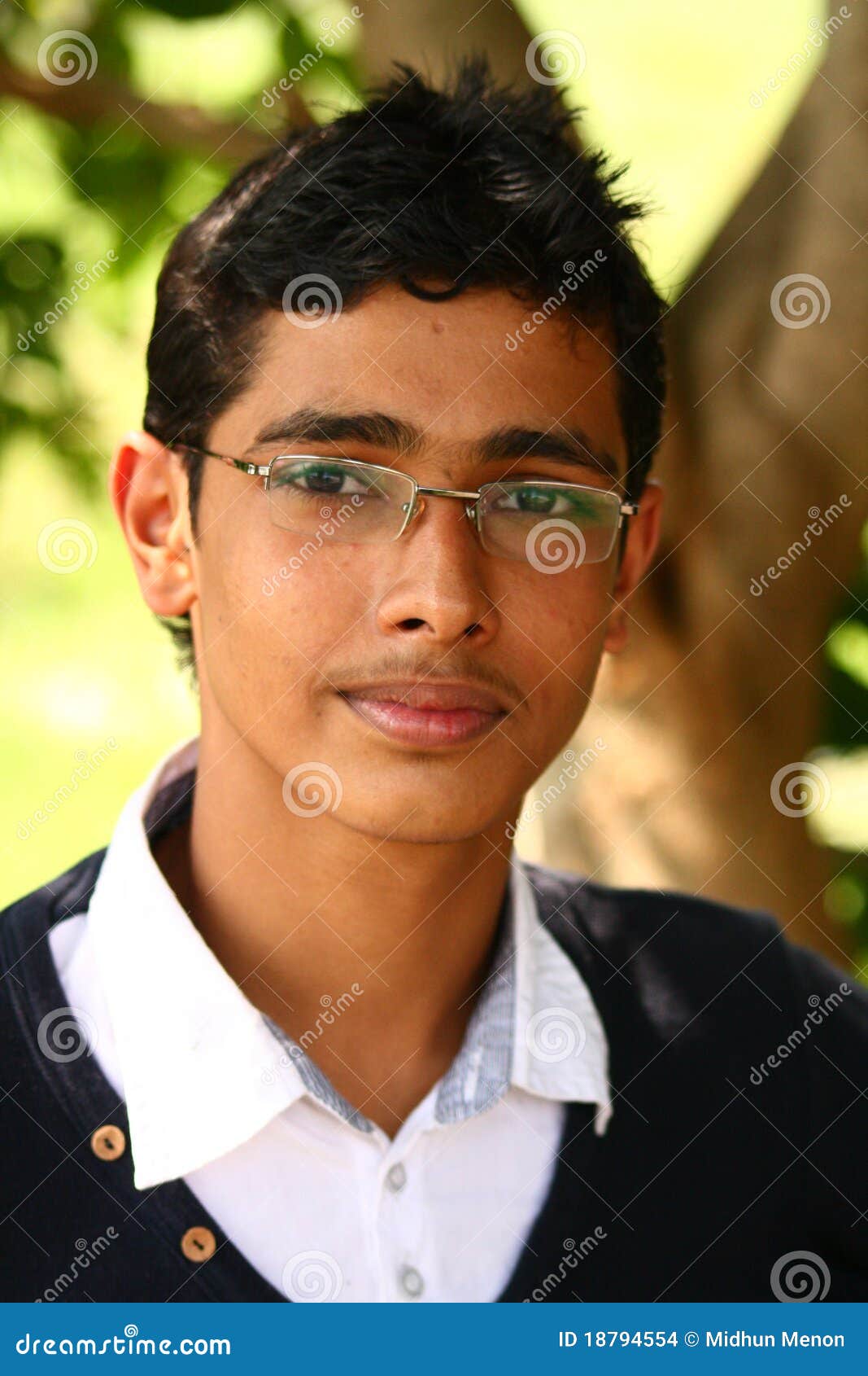 Young Indian Boy With Spiked Hair And Specs Picture. Image: 18794554