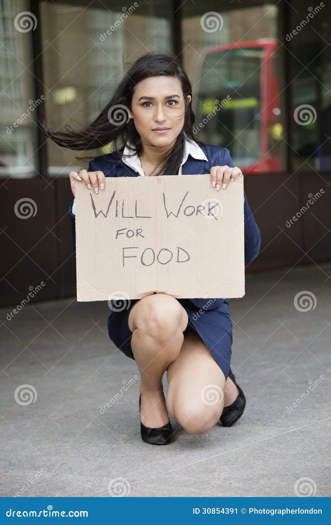 Young Indian Businesswoman Holding Will Work For Food Sign Stock Image