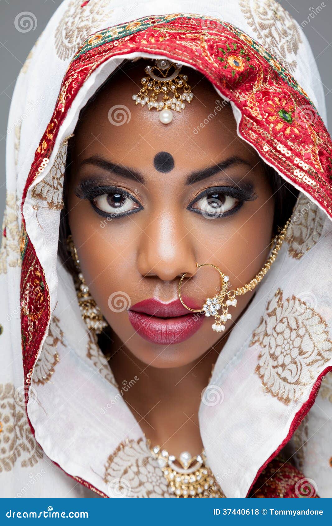 young indian woman in traditional clothing with bridal