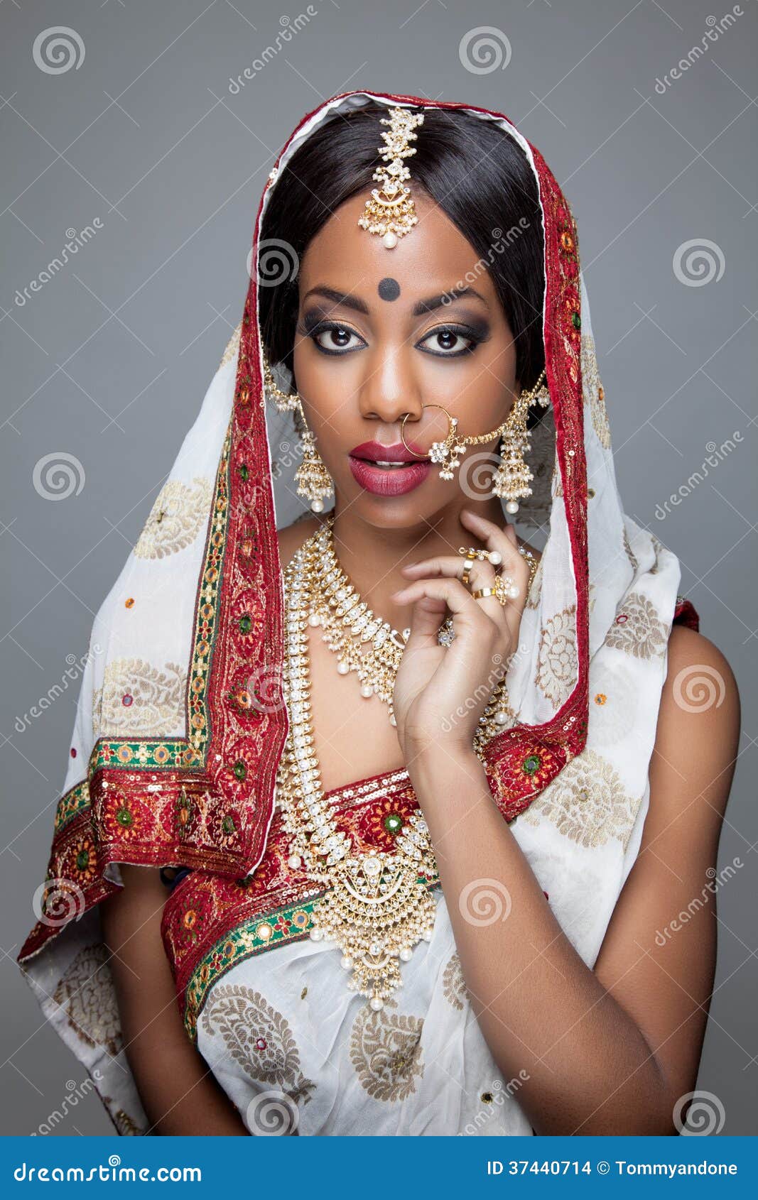 young indian woman in traditional clothing with bridal