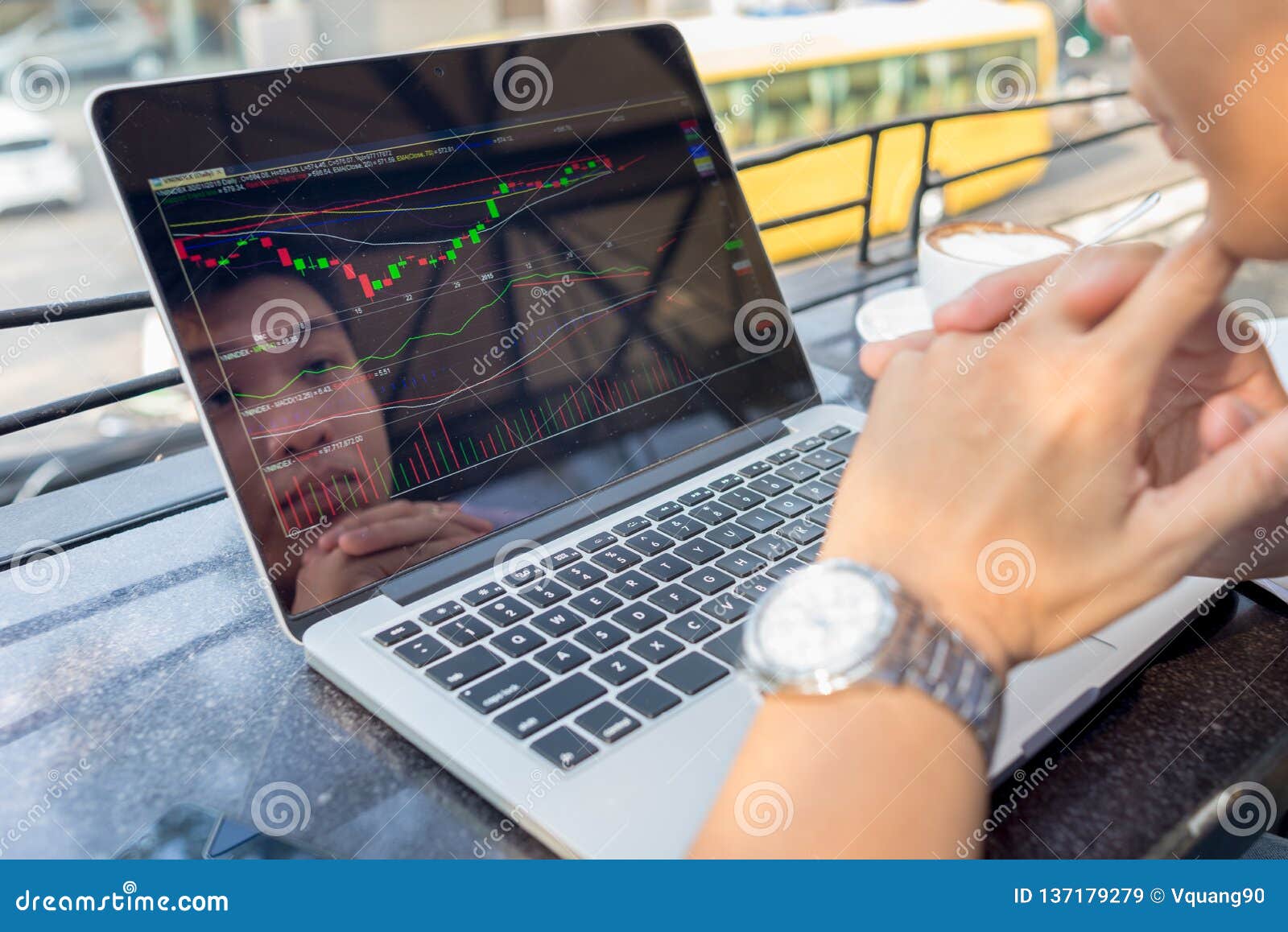 young investor watching the change of stock market on laptop