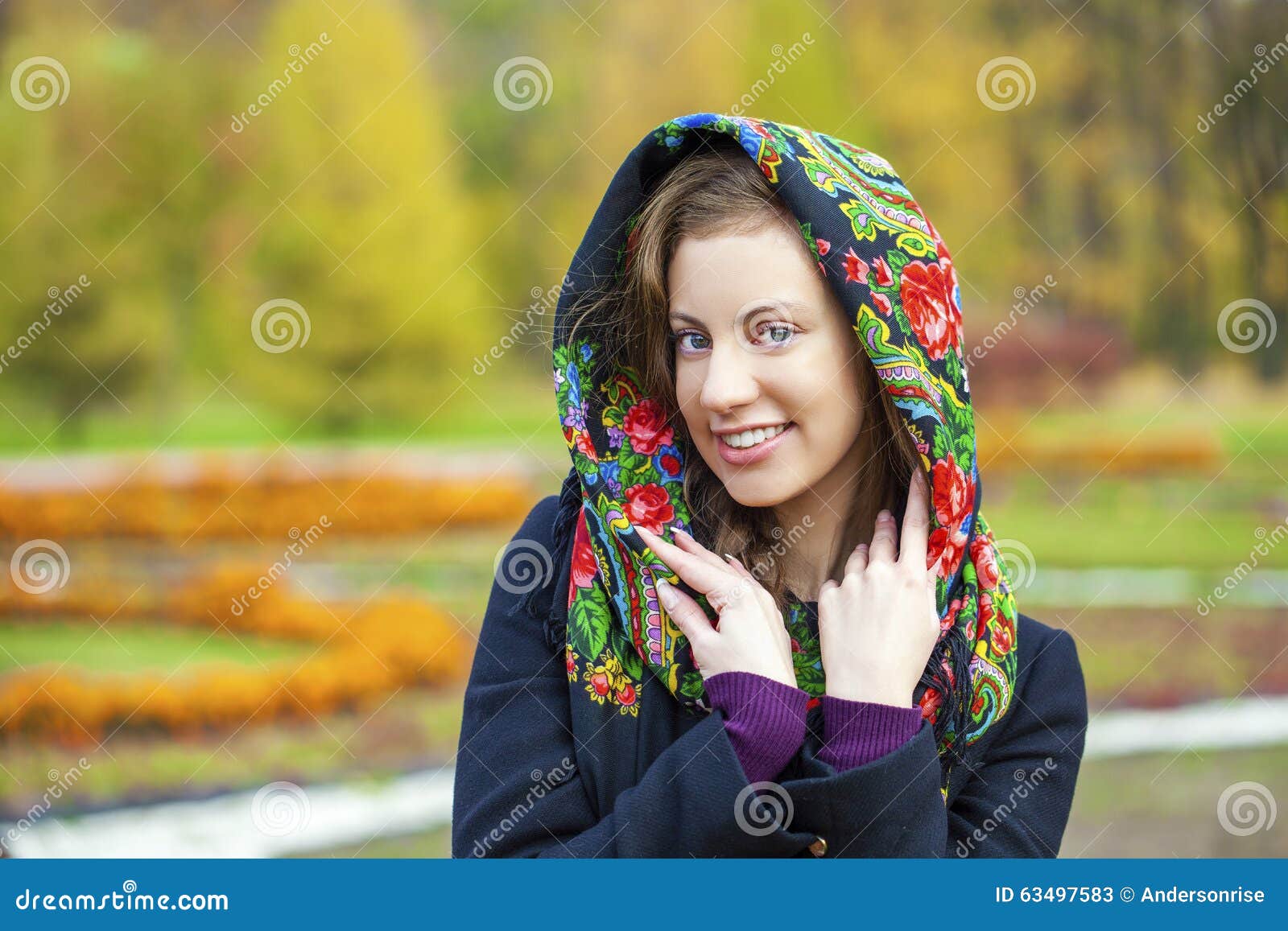 young italians in coat and knit a scarf on her head