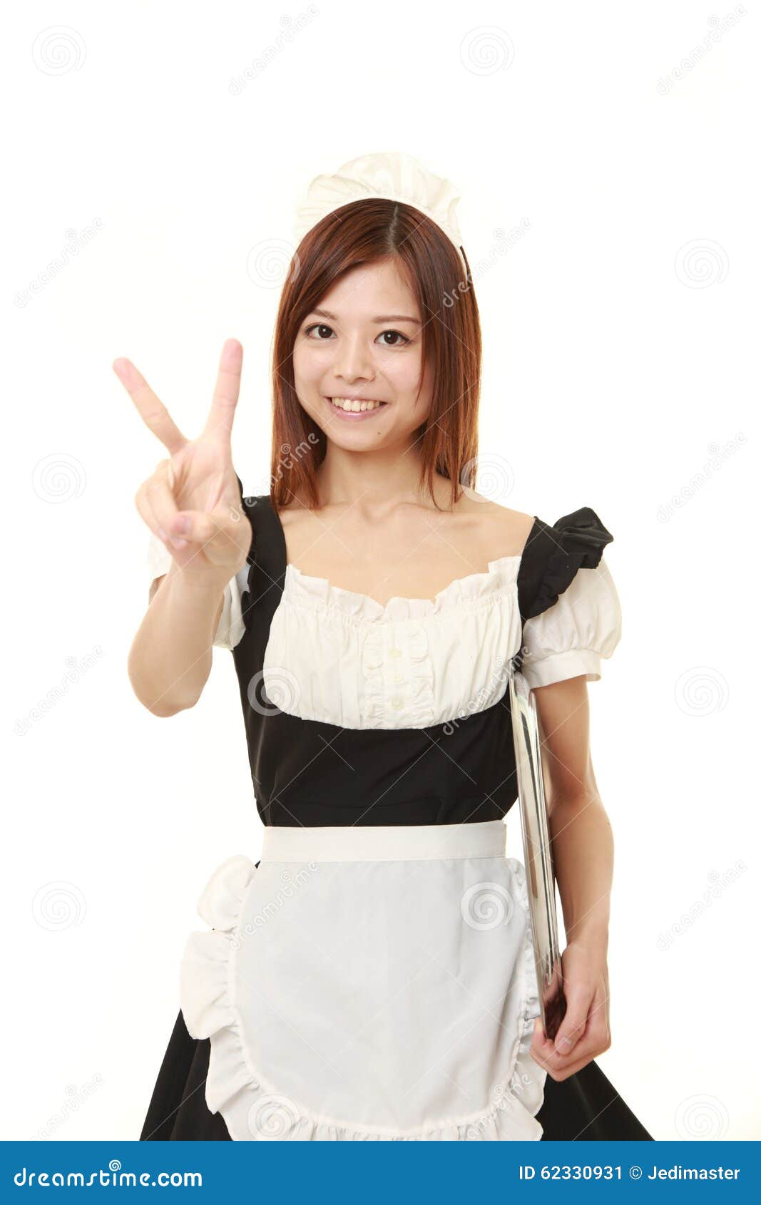 Young Japanese Woman Wearing French Maid Costume Showing A Victory Sign ...