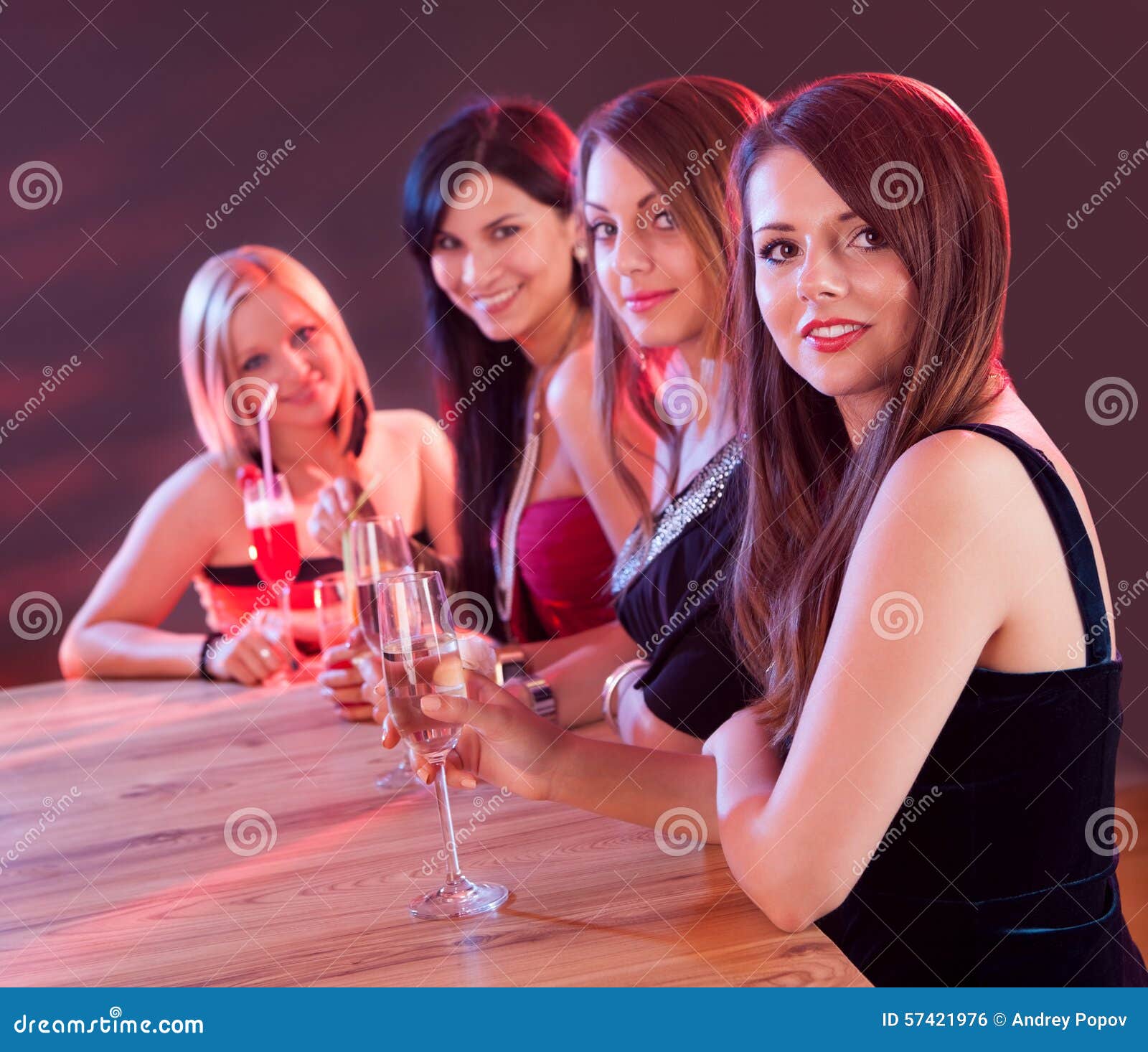 young ladies at a bar counter