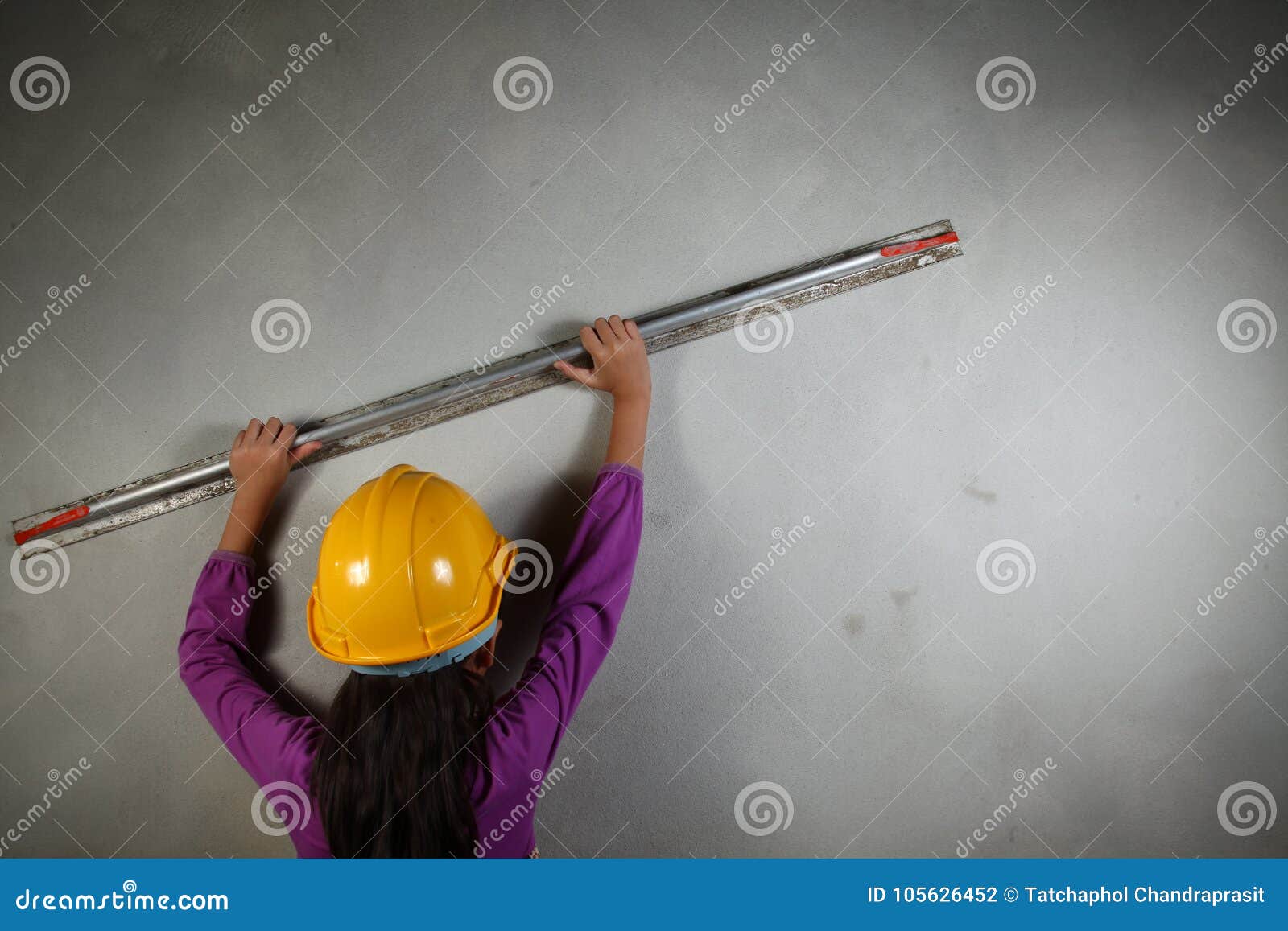 Young Lady with Concrete Cement Grouting Action. Stock Photo - Image of