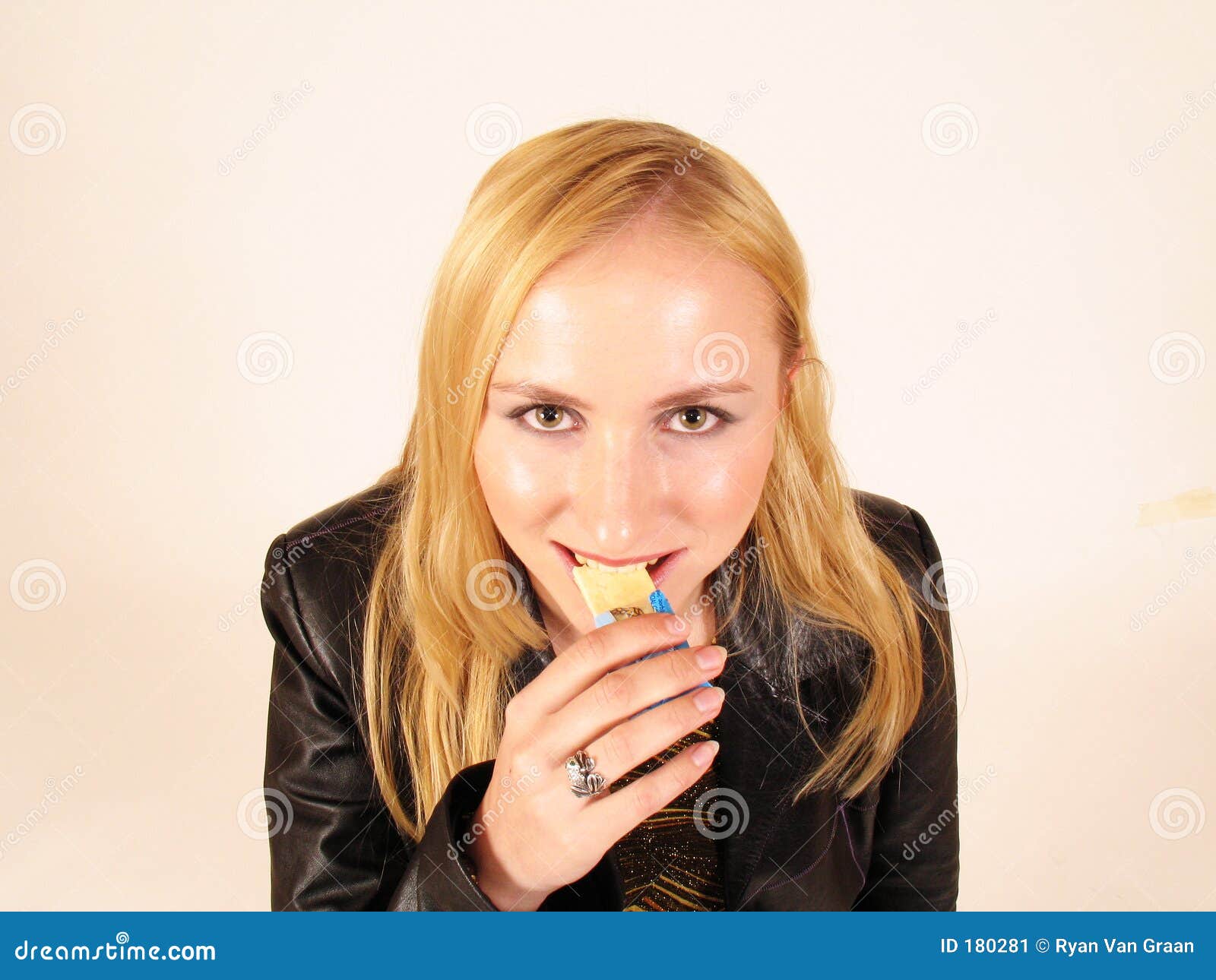 Young Lady Eating a Snack Bar Stock Image Image of eyes, smile 180281