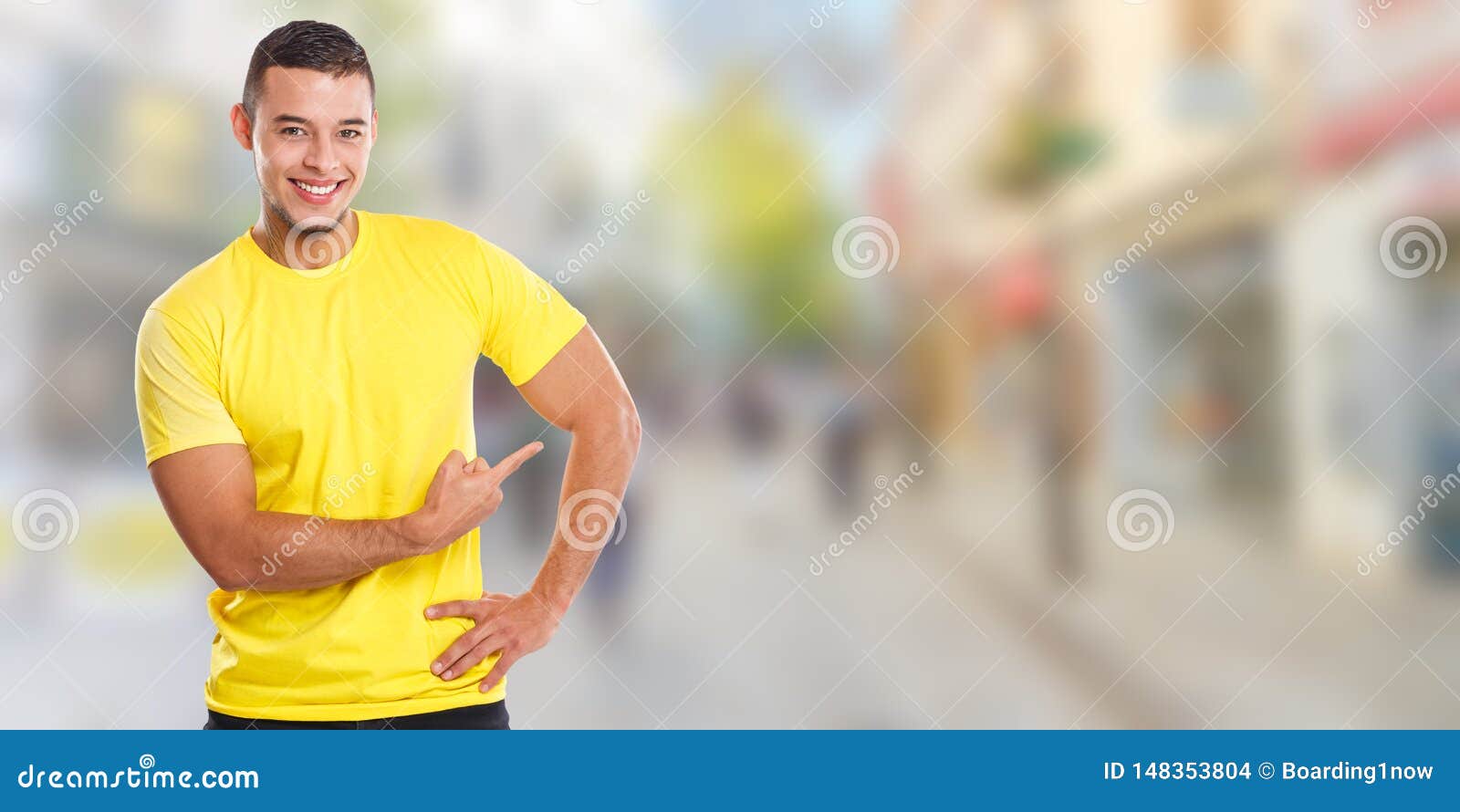 young latin man showing pointing marketing town ad advert people copyspace copy space banner