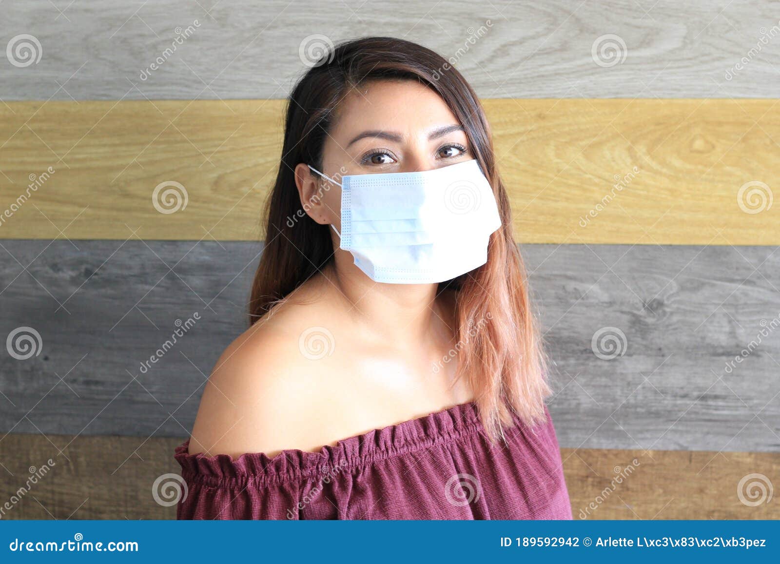 young latin woman with multilayer face masks for clinical use to prevent covid