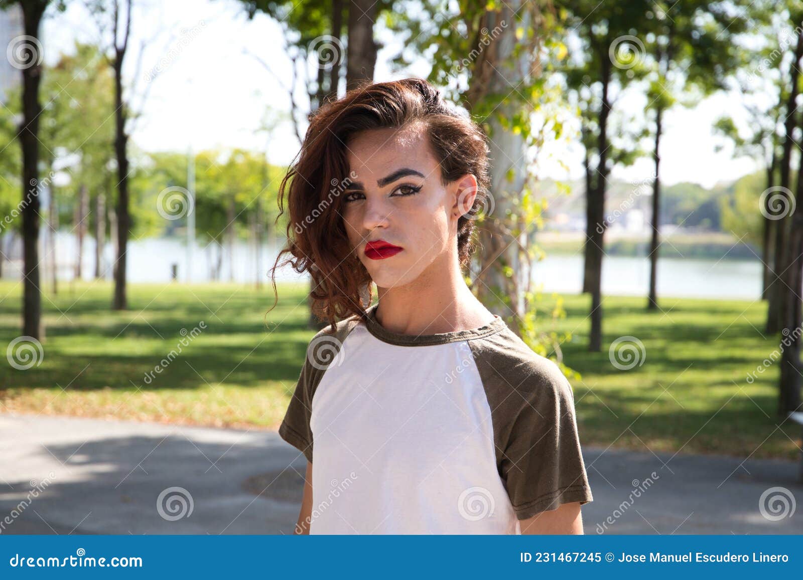 Young Latina Transsexual Woman Is In A Park Where She Is Going To Start