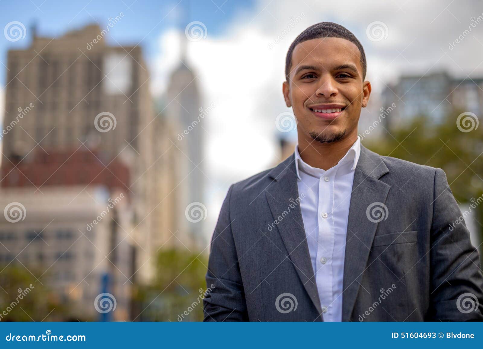 young latino man in city smile face