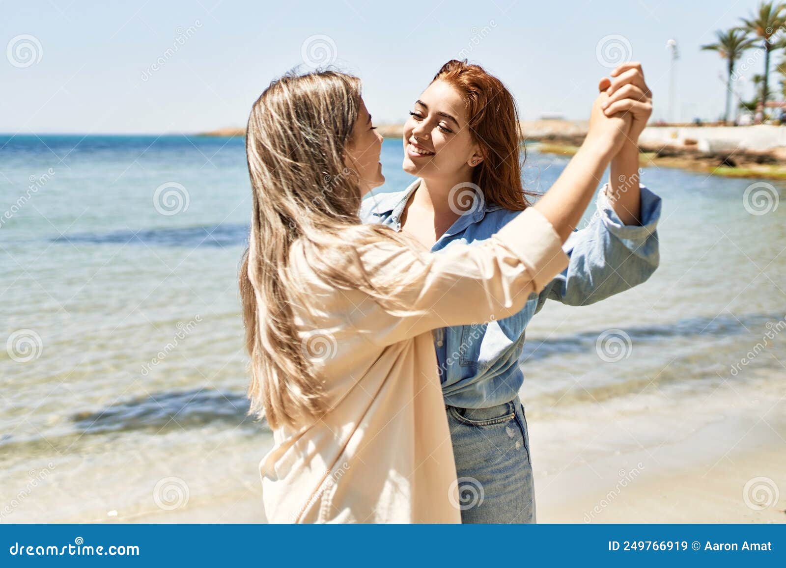 Young Lesbian Couple Of Two Women In Love At The Beach Stock Image 