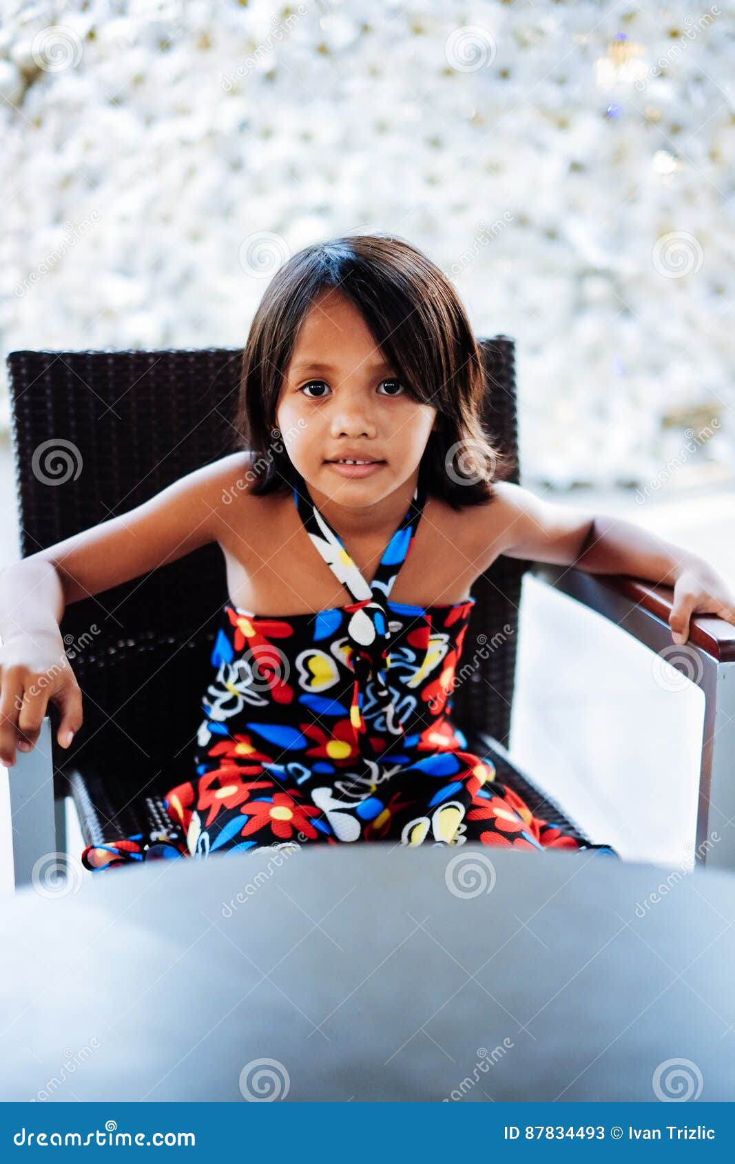 Young Little Cute Girl Sitting on the Chair Alone Waiting Stock Image ...