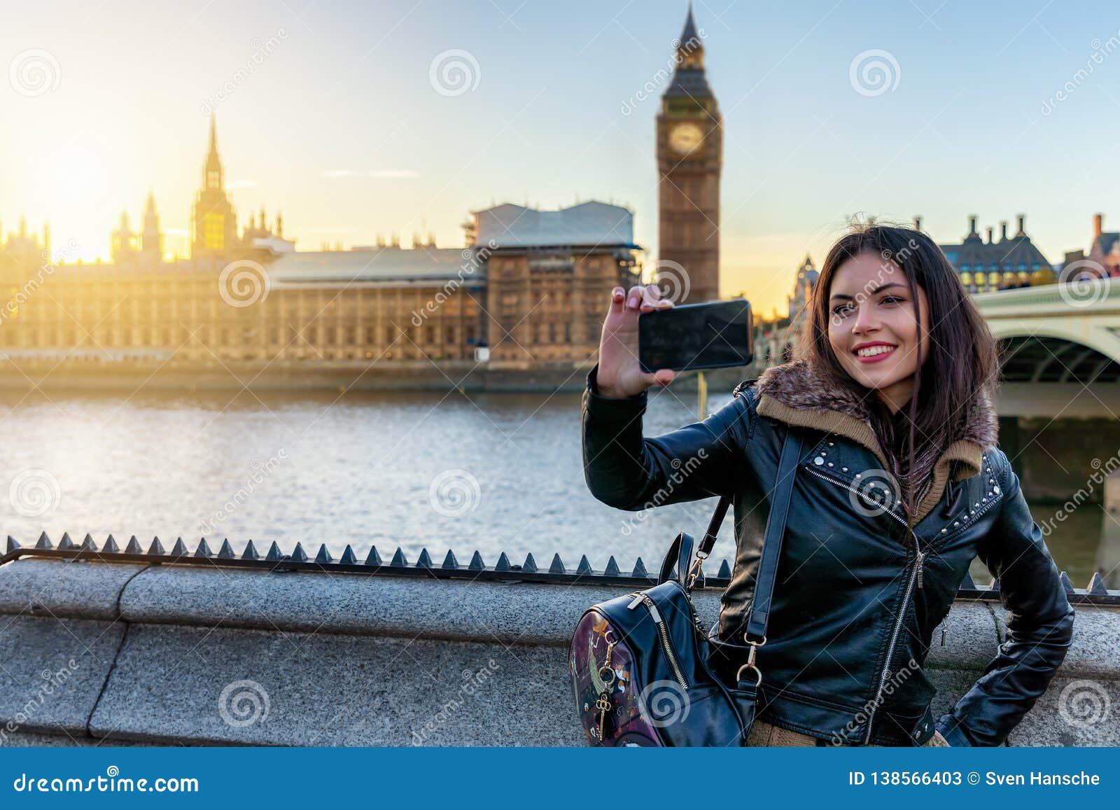 london traveler woman takes selfie pictures at westminster, uk