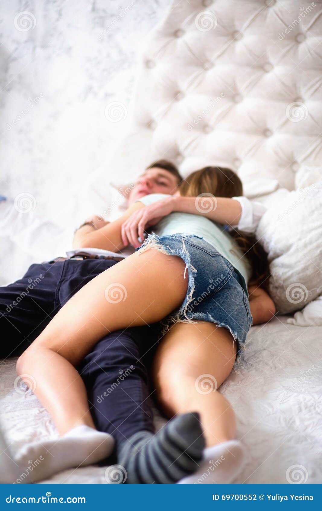 girl on boy bed