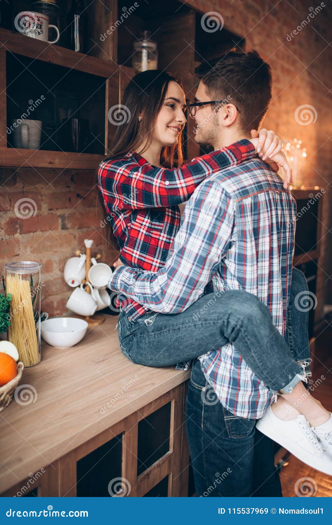 Young Love Couple Hugs on the Kitchen Stock Image - Image of ...