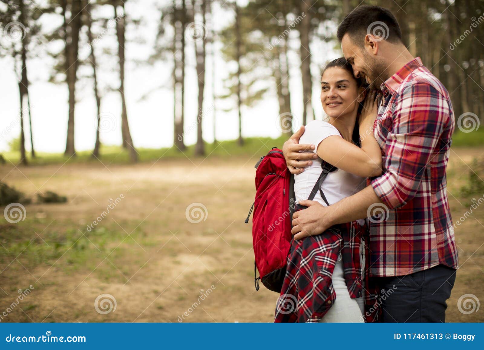 Loving Couple Having Fun In The Forest At Spring Time Stock Image