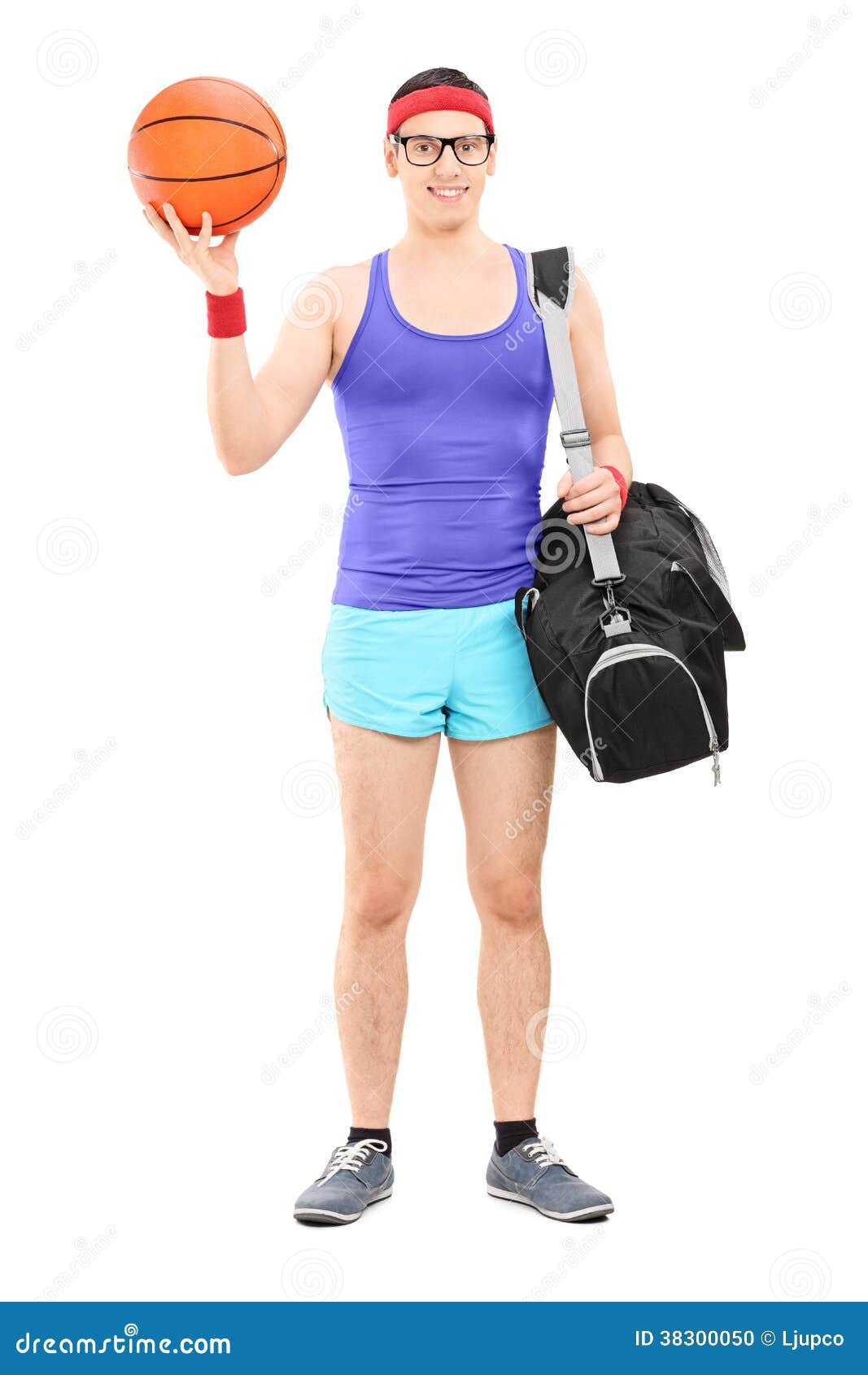 Young Male Athlete With Sports Bag Holding A Basketball Stock Photo ...