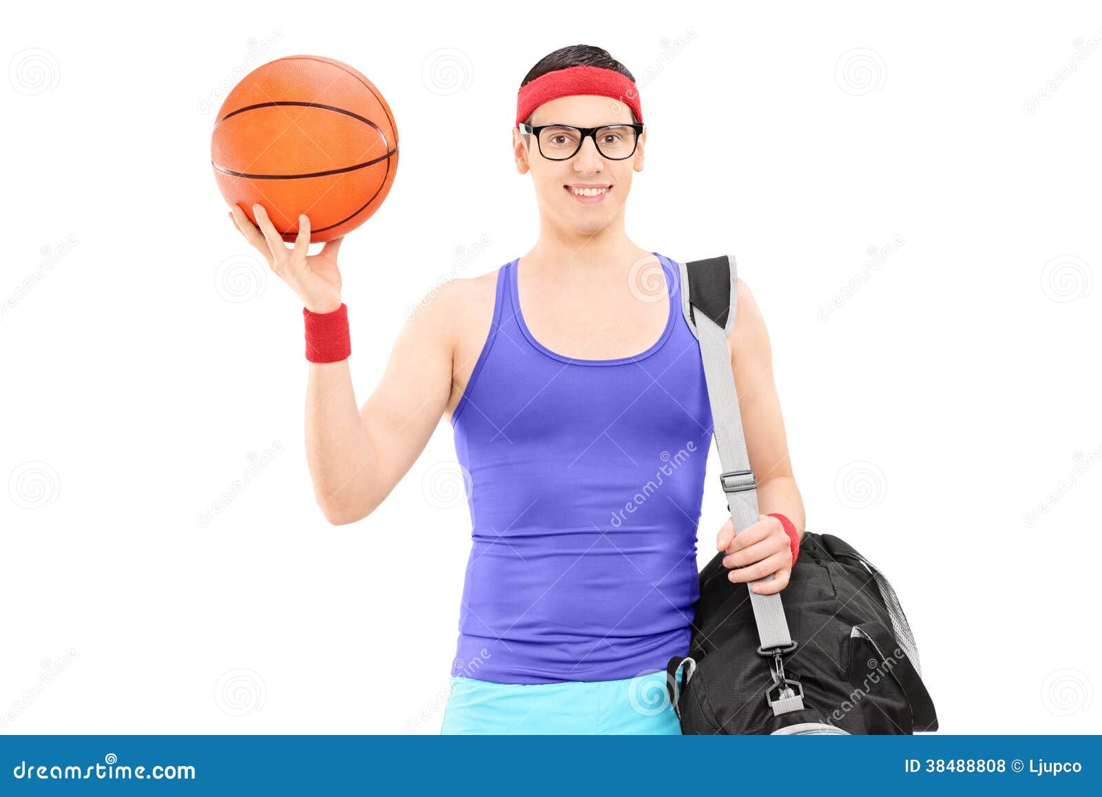 Young Male Athlete With Sports Bag Holding A Basketball Stock Photo ...