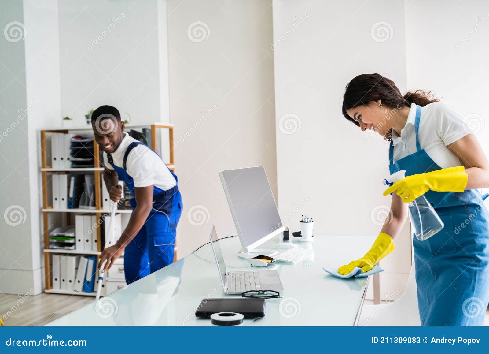 Male and Female Cleaners Cleaning Office Stock Image - Image of chair ...