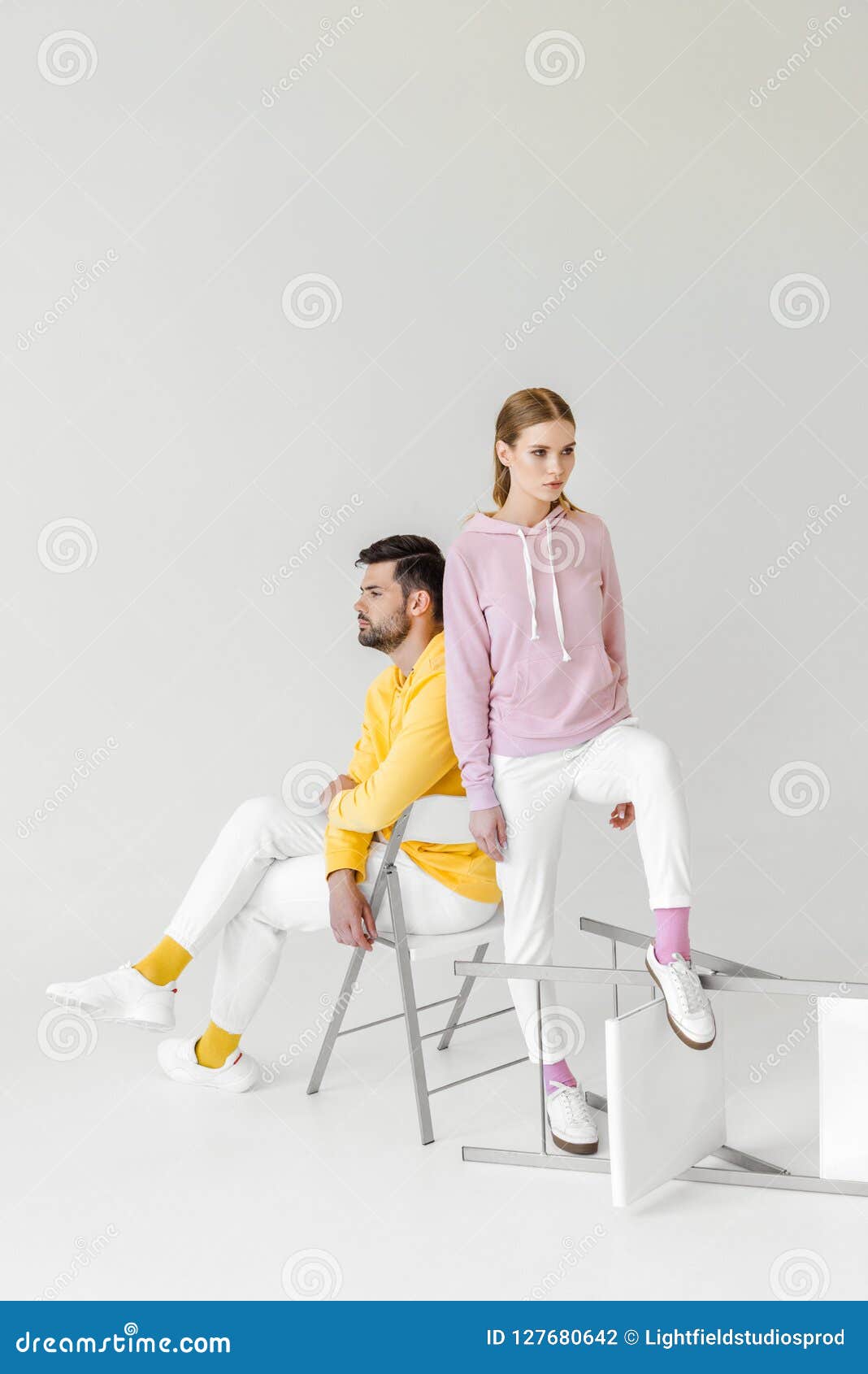 Young Male and Female Models in Stylish Hoodies Stock Photo - Image of ...