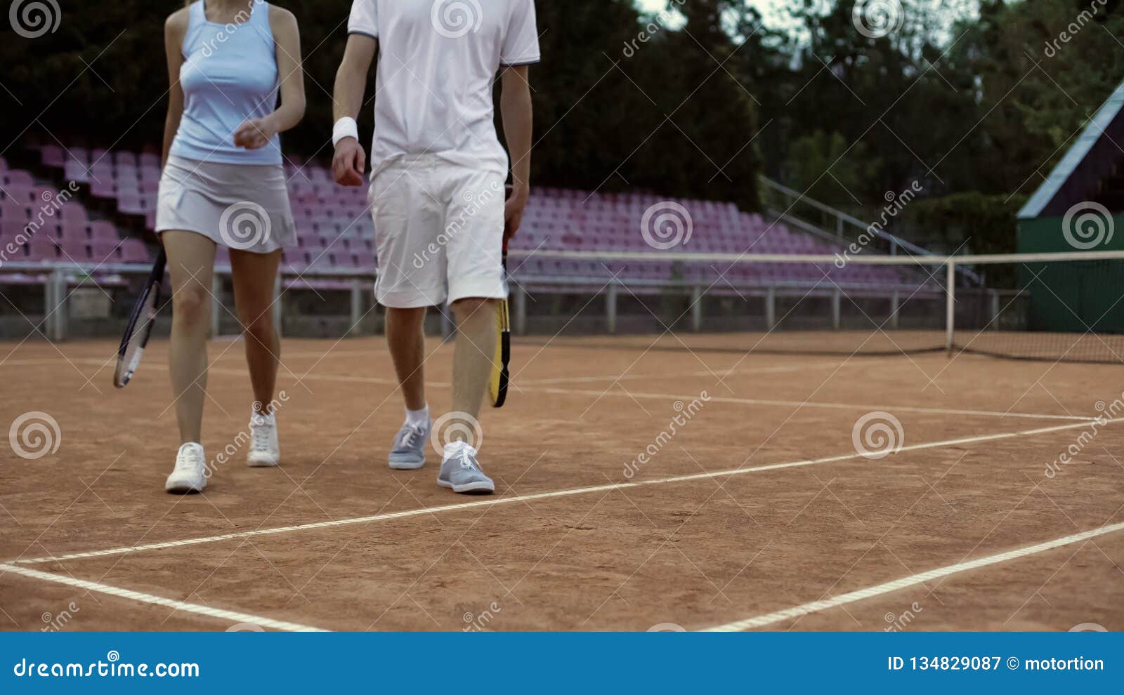 Young Male And Female Tennis Players Walking On Court After Match Close Up Stock Image Image Of Move Sport