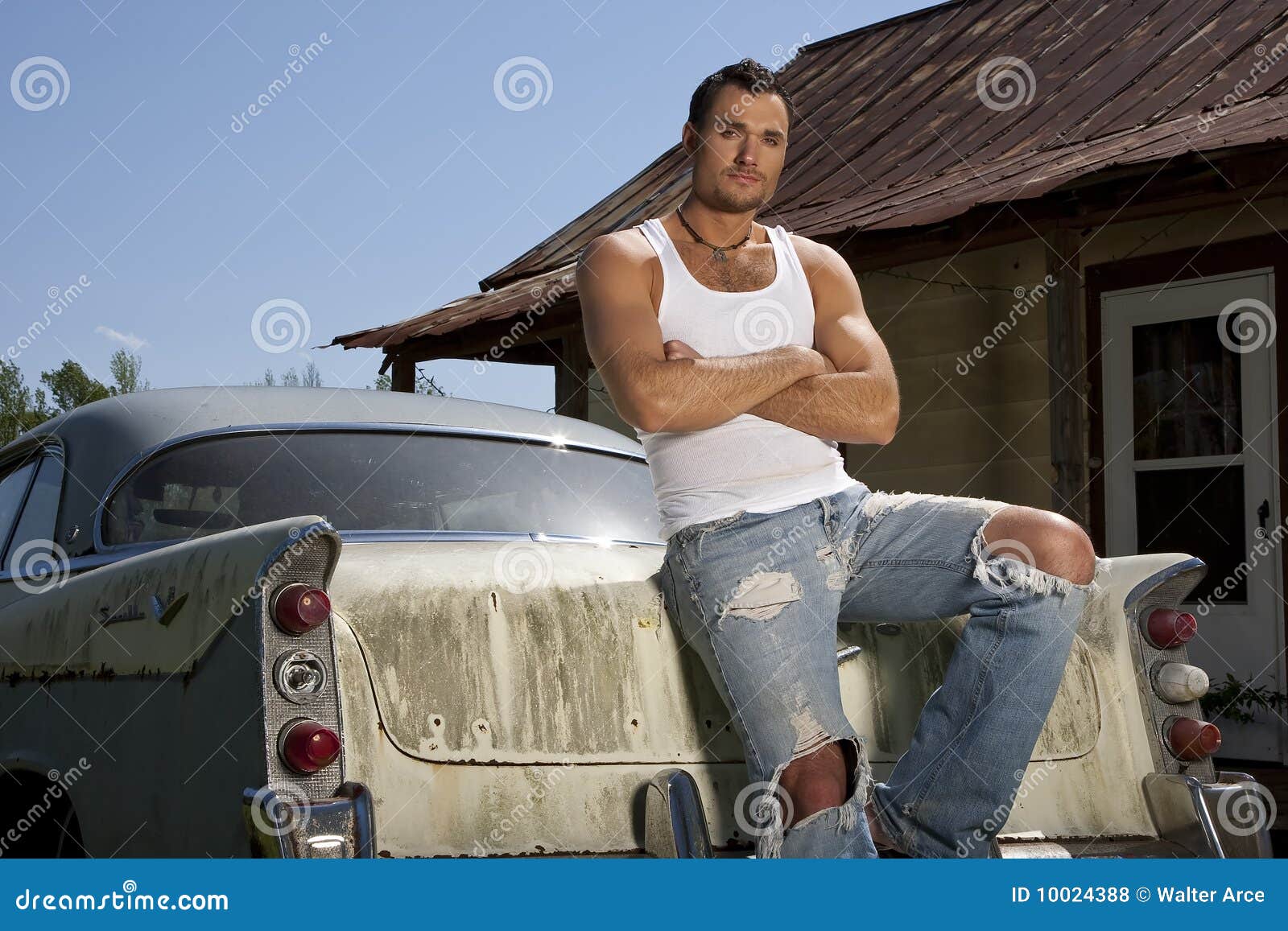 Spanish stylish man with tattoos posing in the car Stock Photo - Alamy