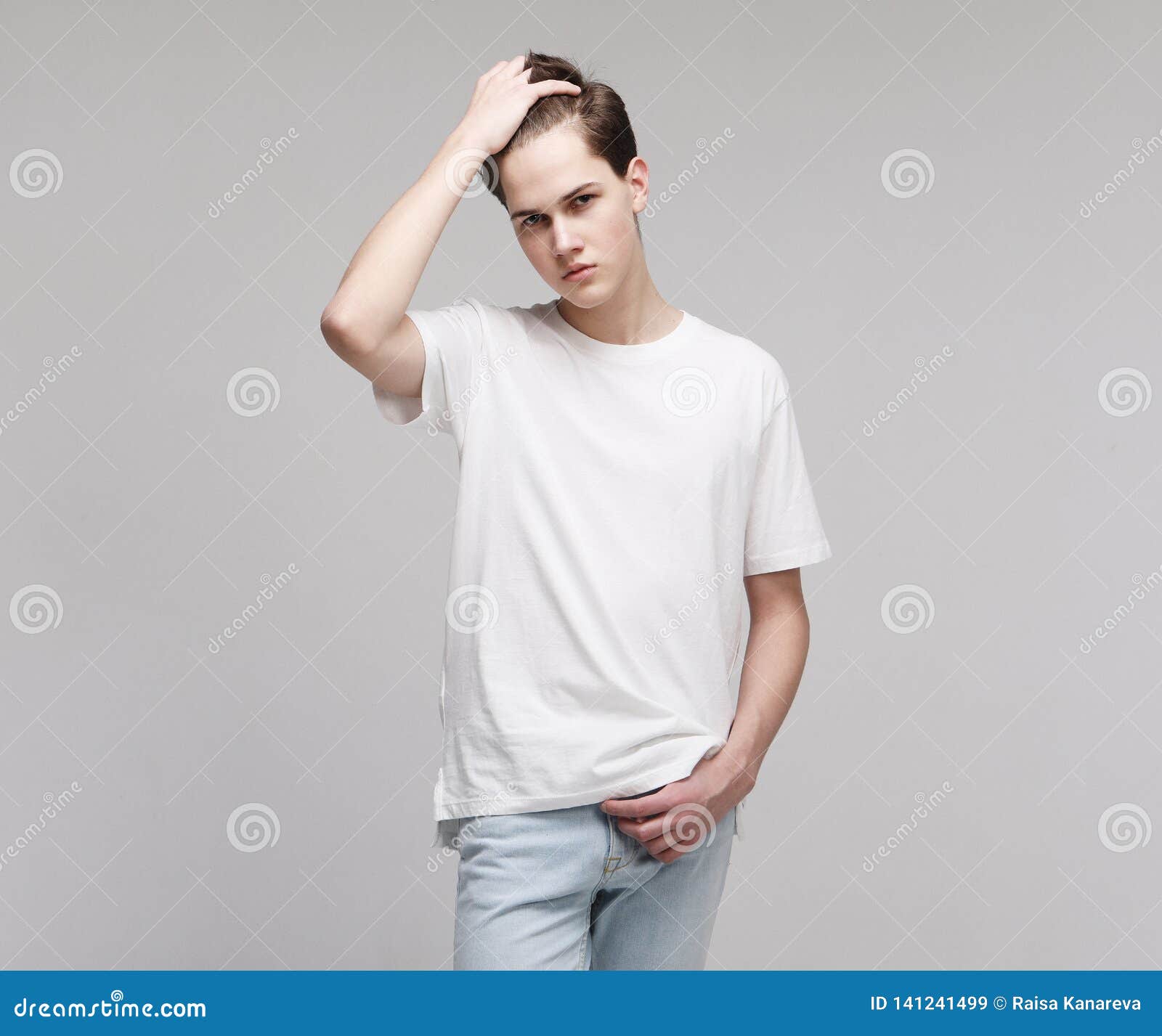 Young Model Wearing T-shirt Stock Image - Image of male, pose: 141241499