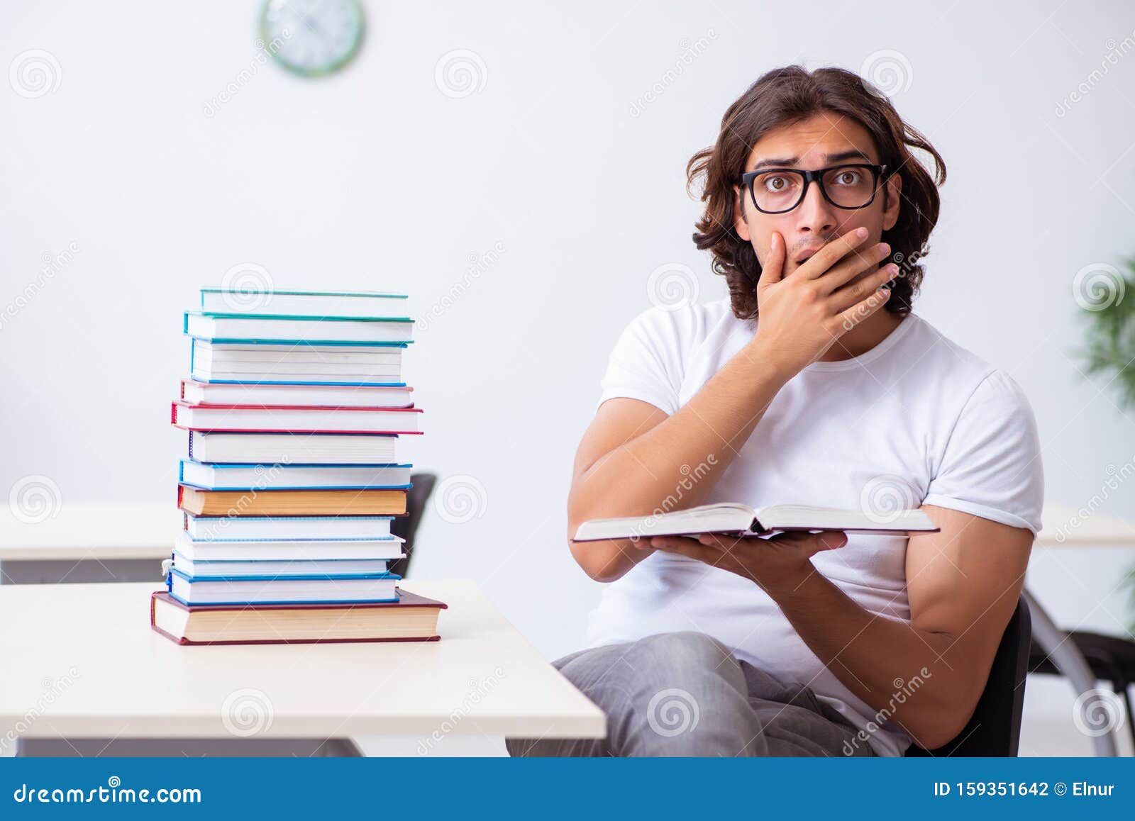 Young Male Student Sitting in the Classroom Stock Photo - Image of ...