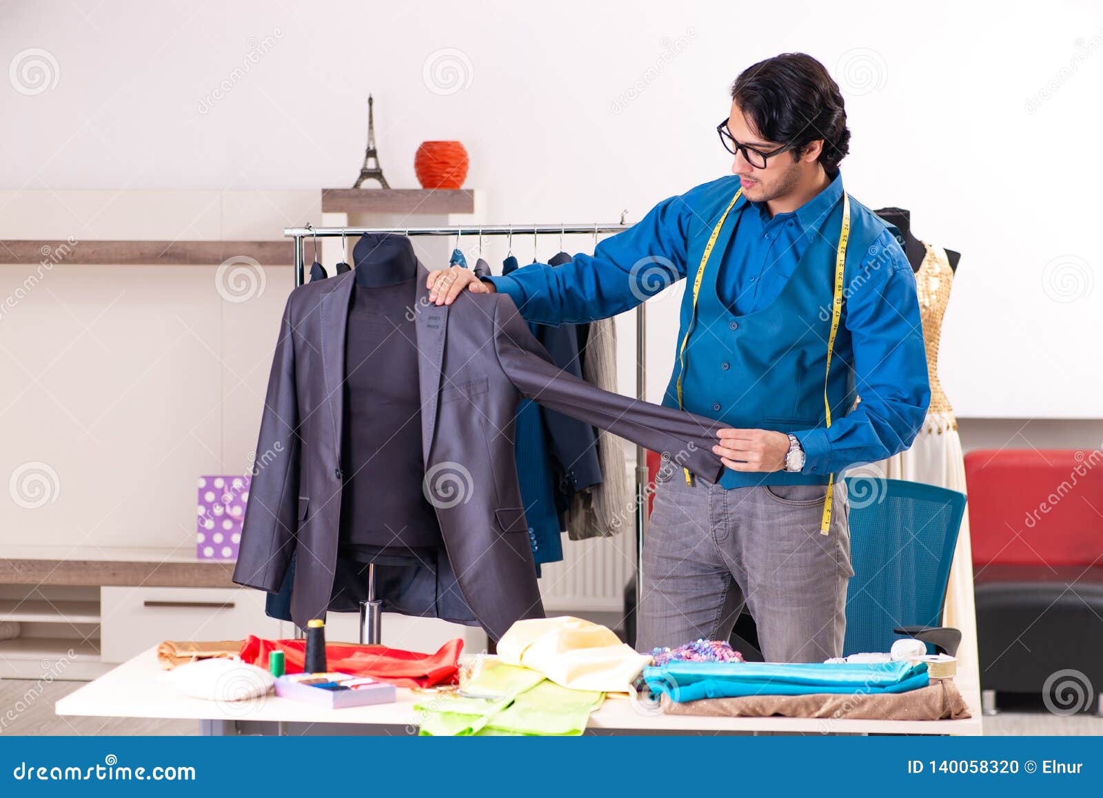 The Young Male Tailor Working at Workshop Stock Photo - Image of ...