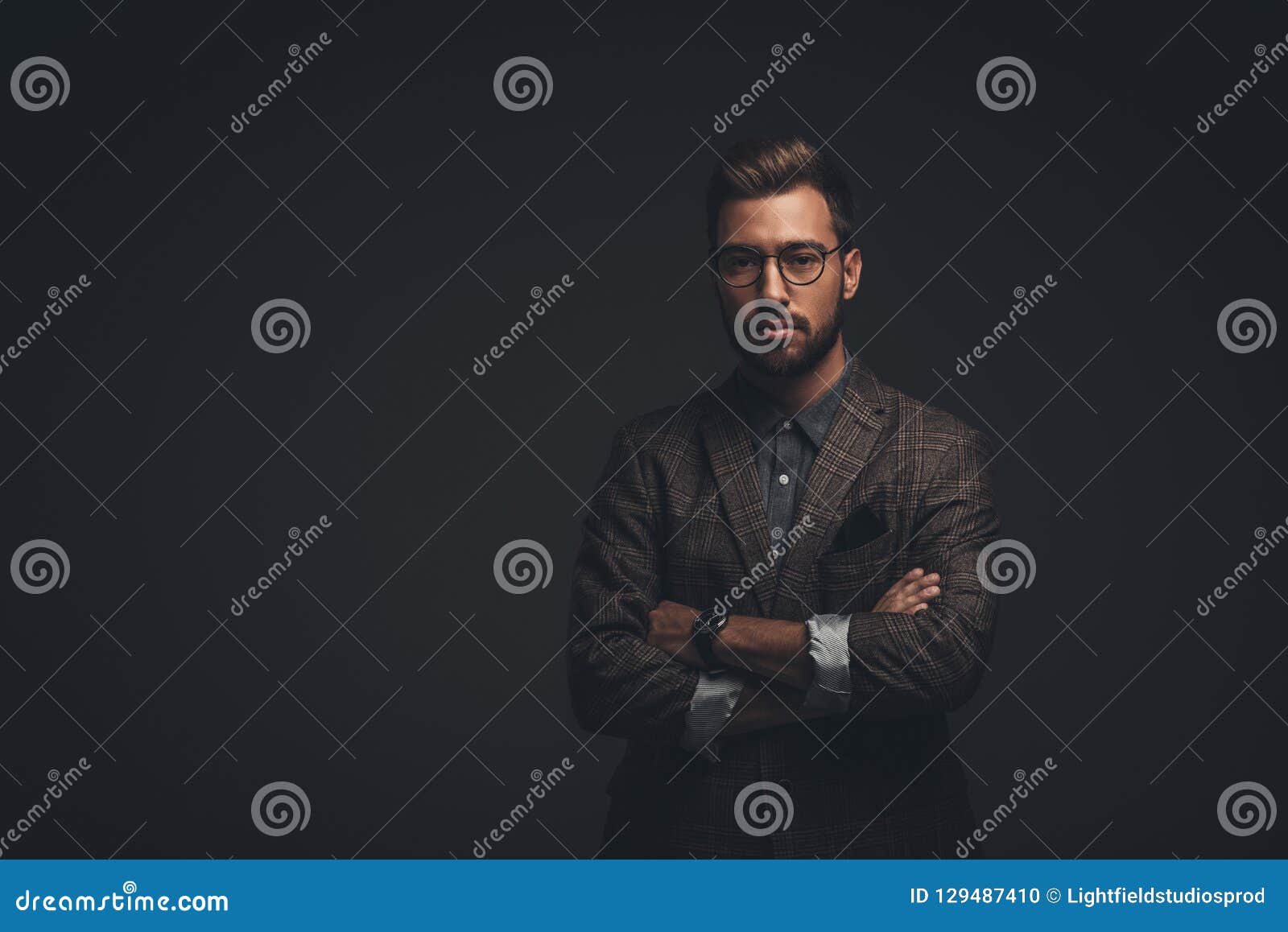 Young Man with Arms Crossed Stock Photo - Image of suit, modeling ...