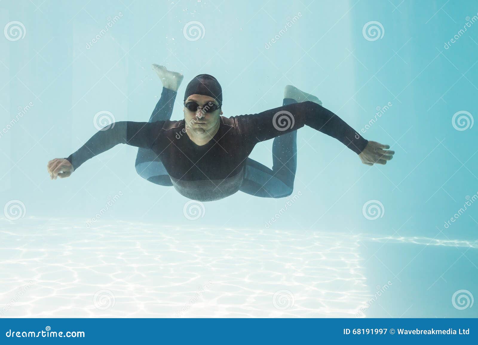 Young Man with Arms Outstretched while Swimming Stock Image Image of
