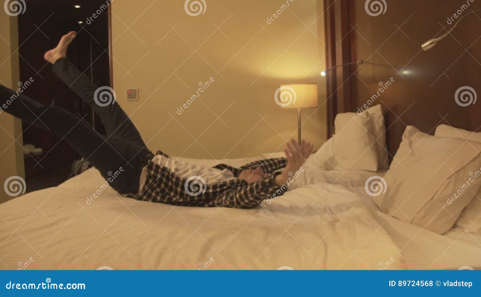 Young Man with Baggage Check in Hotel Room Stock Footage Video of