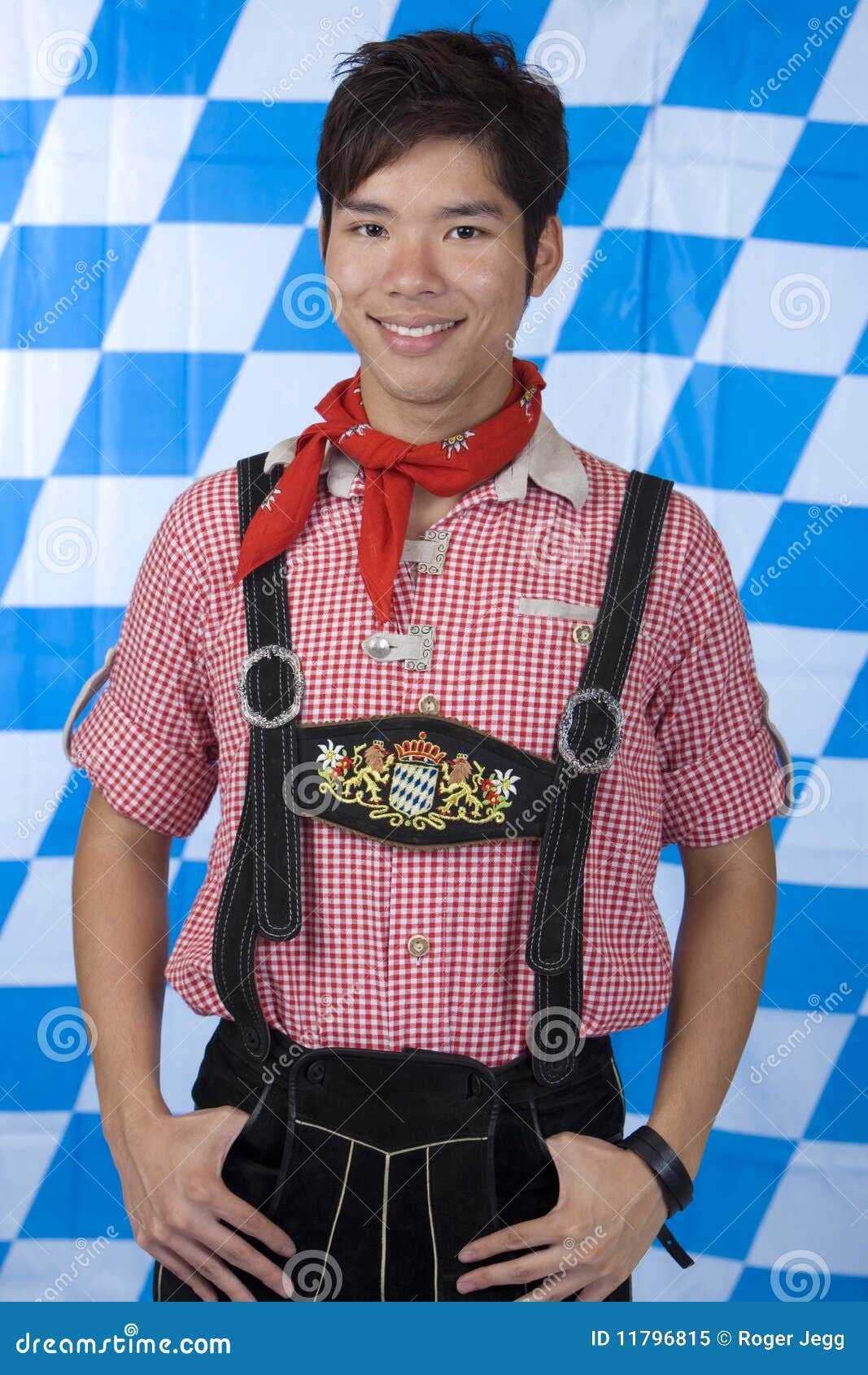 young man with bavarian oktoberfest lederhose