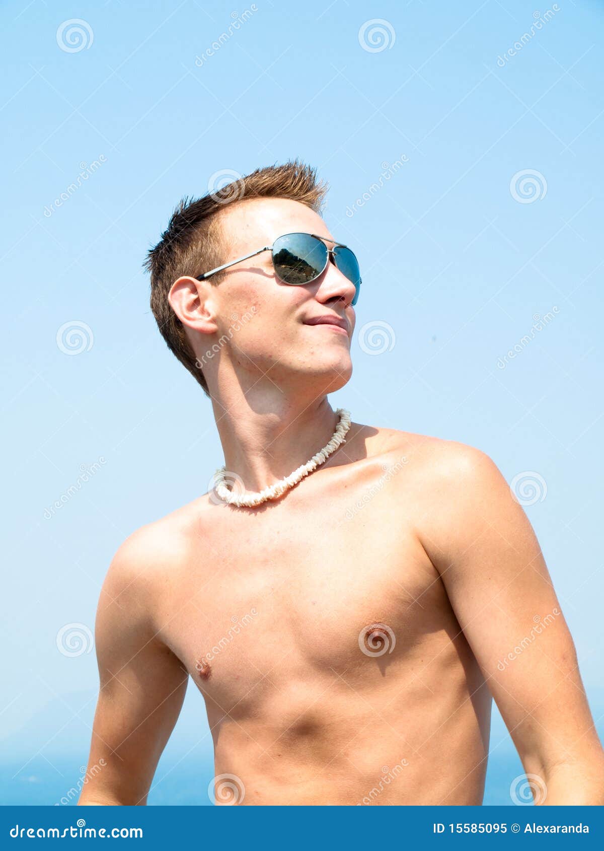Young Man At The Beach Royalty Free Stock Photo - Image: 15585095