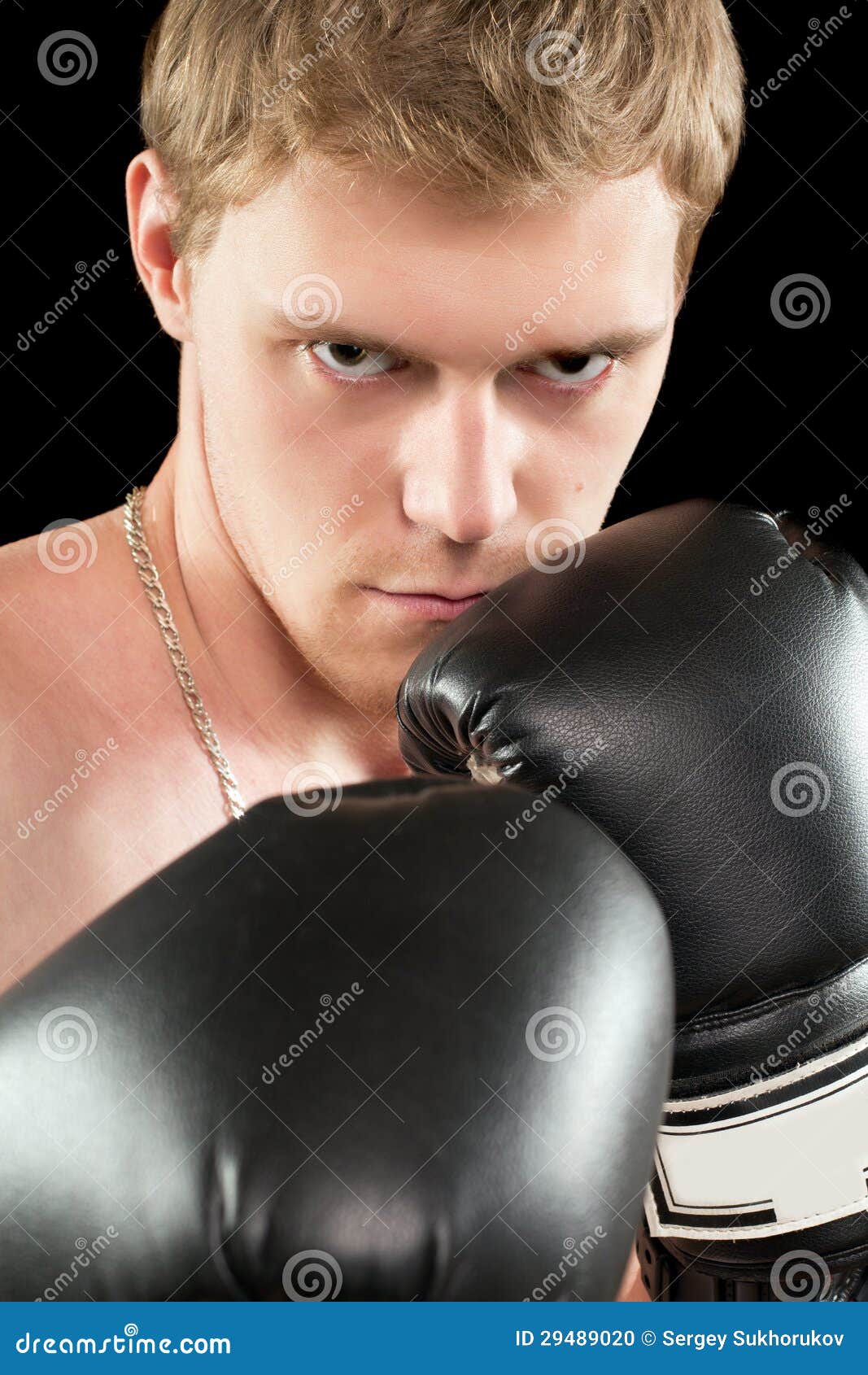 Young man in boxing gloves stock photo. Image of anger 29489020