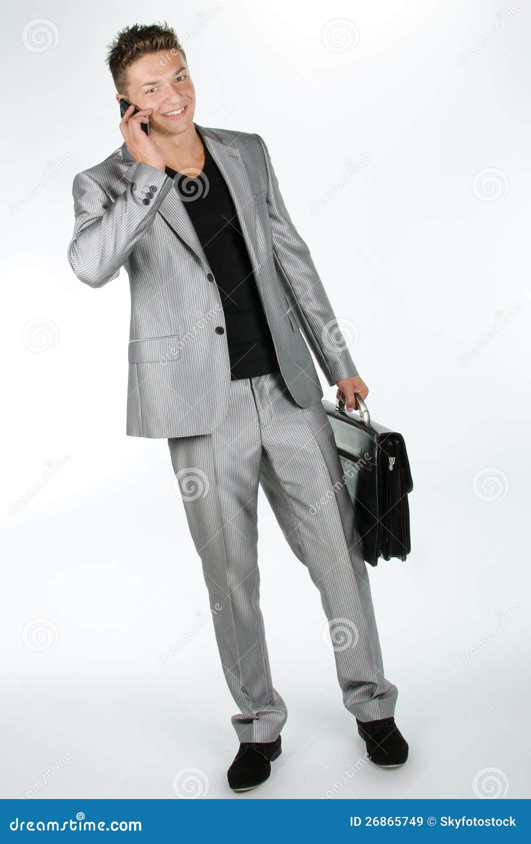 Young Man with Briefcase and Cell Phone Stock Image Image of mood