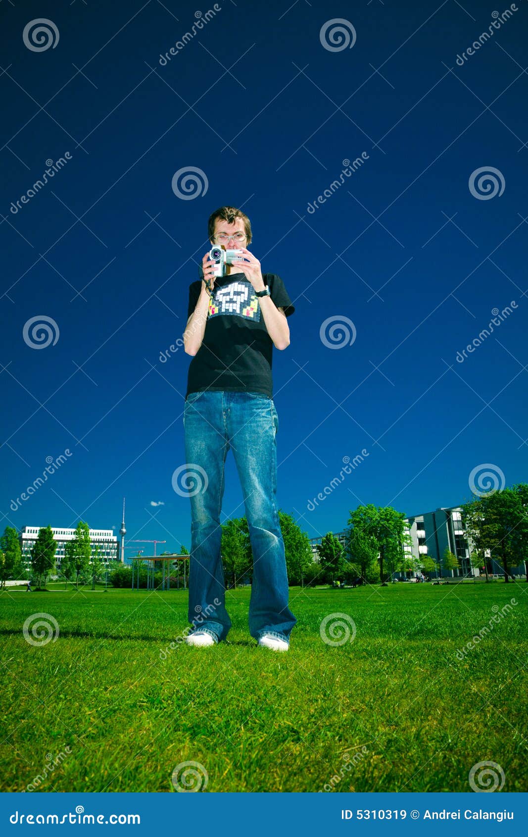 Young man with camcorder stock image. Image of electronics 5310319
