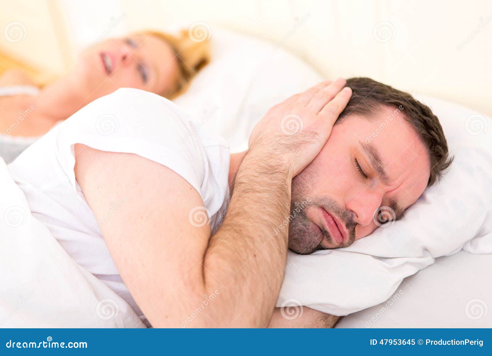 Young Man Can T Sleep because of Girlfriend S Snoring Stock Image