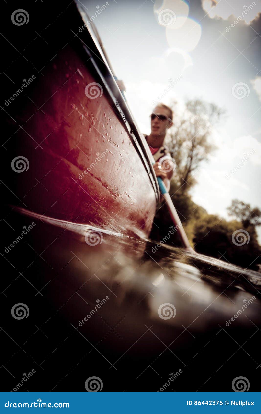 Young Man Canoeing stock photo. Image of male, rowing 86442376