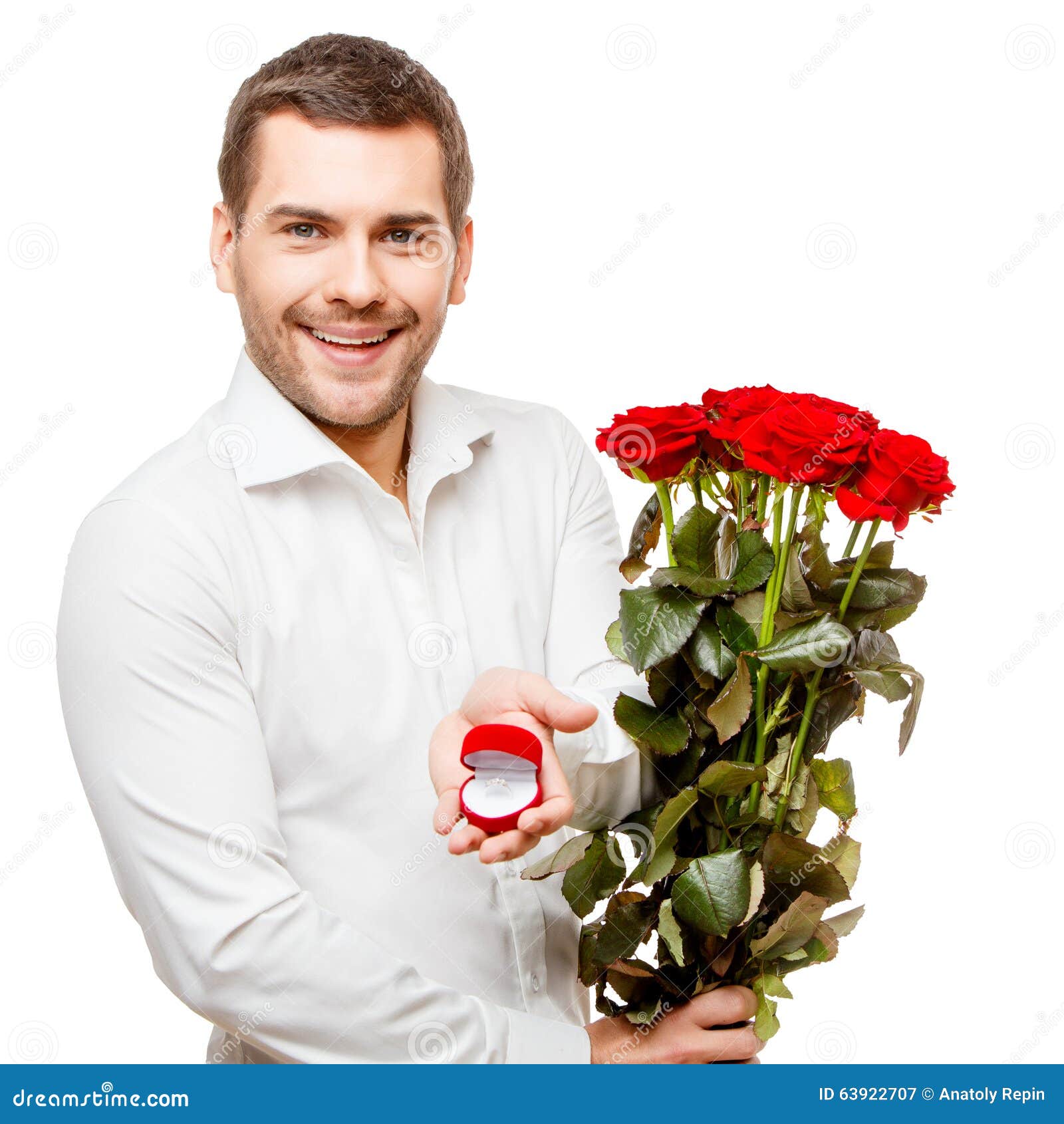 Young Man Carries Heart Shaped Box And Flowers Stock Image Image Of Positive Cute 63922707