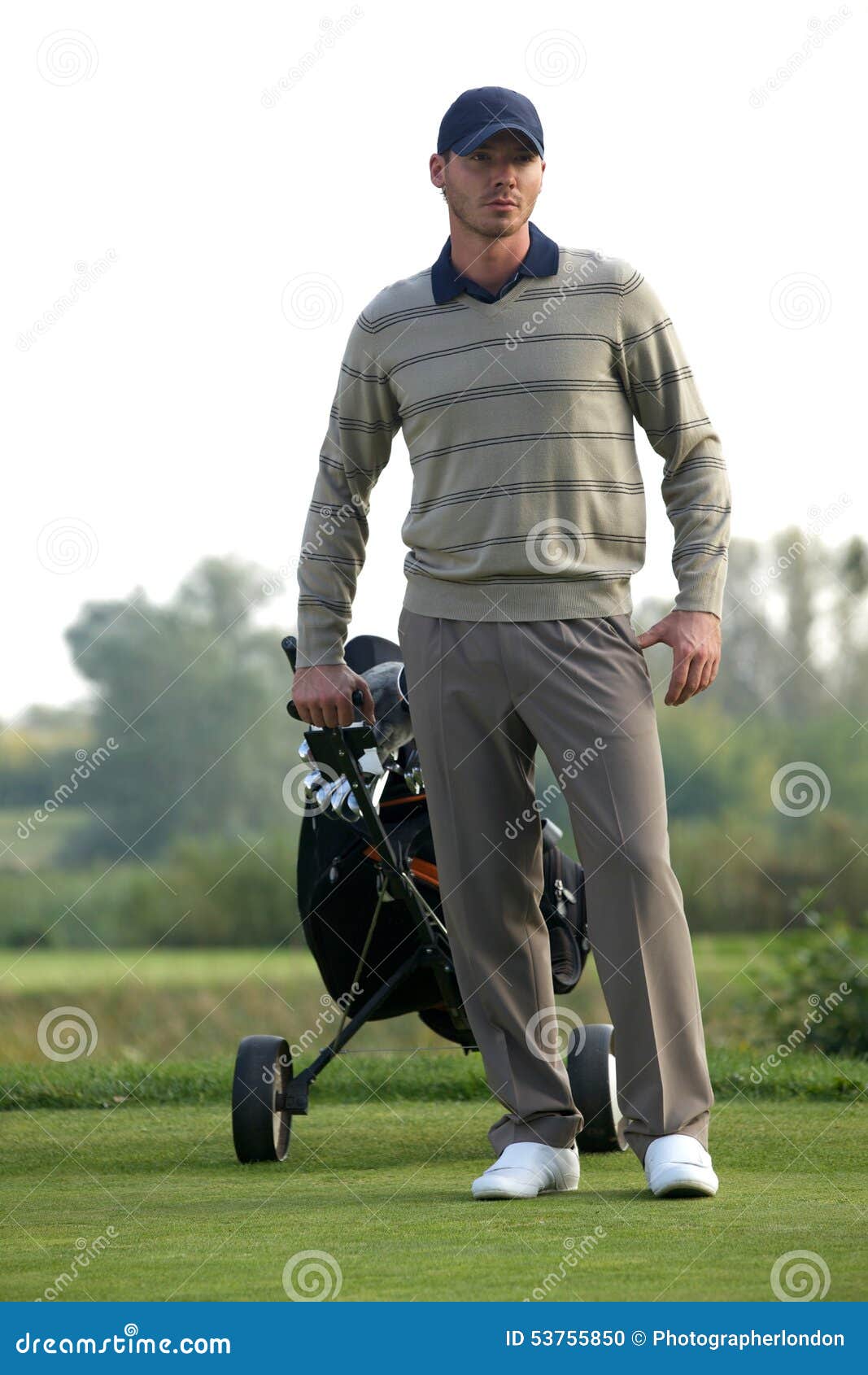 Young Man Carrying Trolley with Golf Bag Stock Photo Image of front
