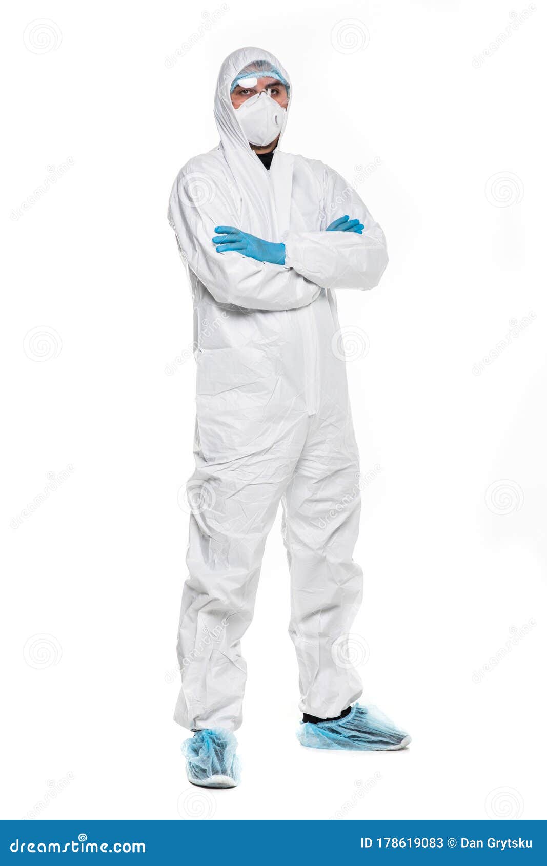 young man in chemical protective suit making stop gesture on white background. virus research