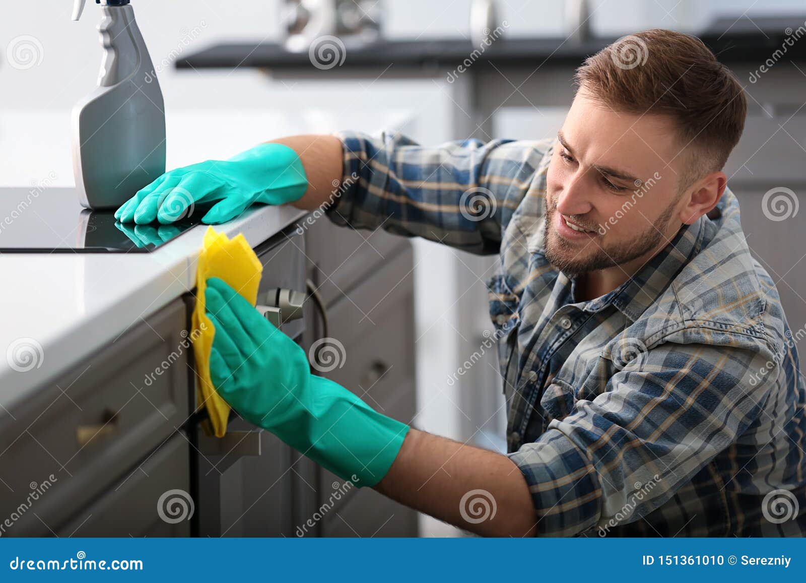 Cleaning Kitchen Appliance Vents On Microwave RoyaltyFree Stock Photography