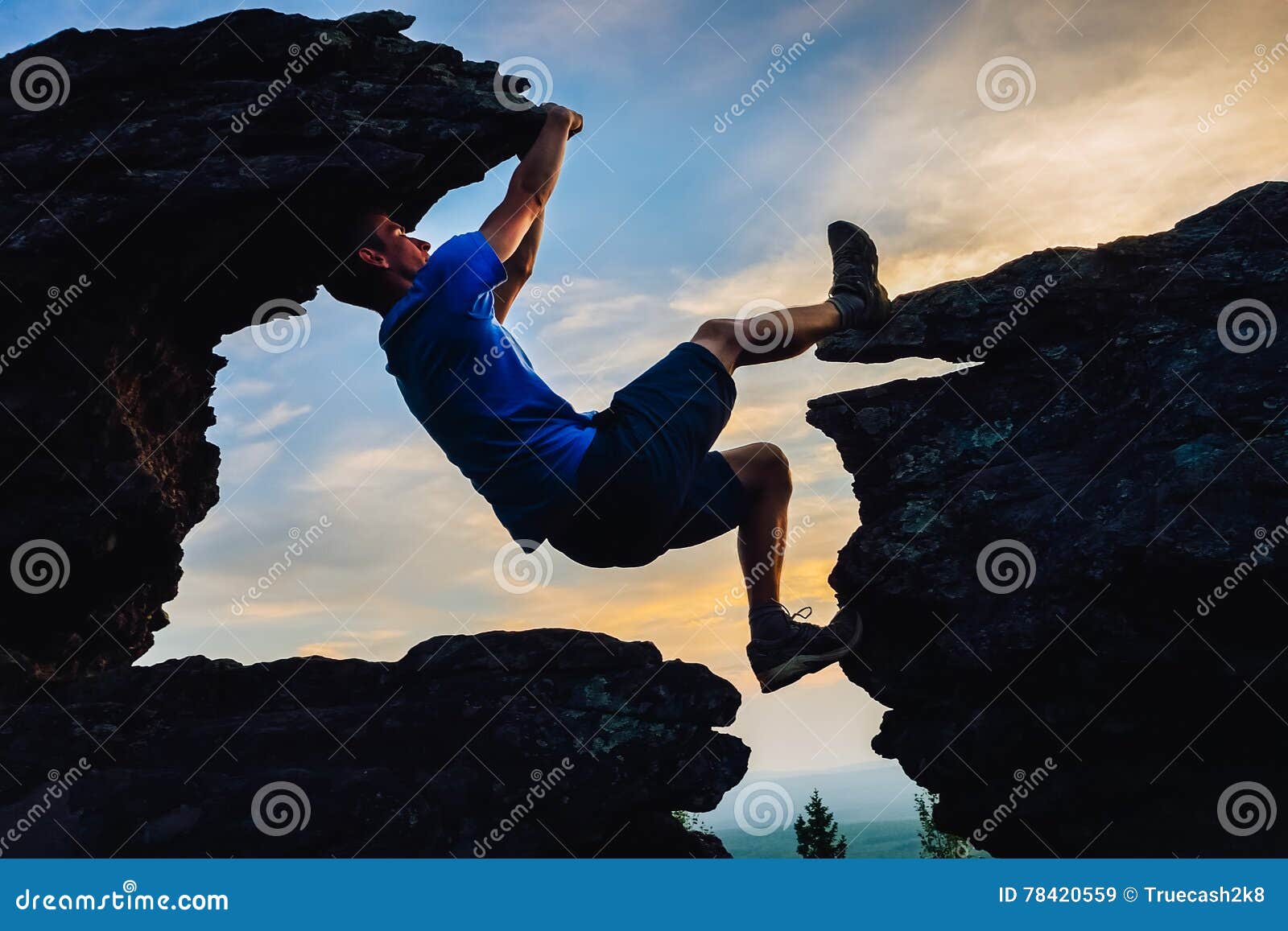 Young Man Climbing on Top of Rock Mountain Stock Image Image of