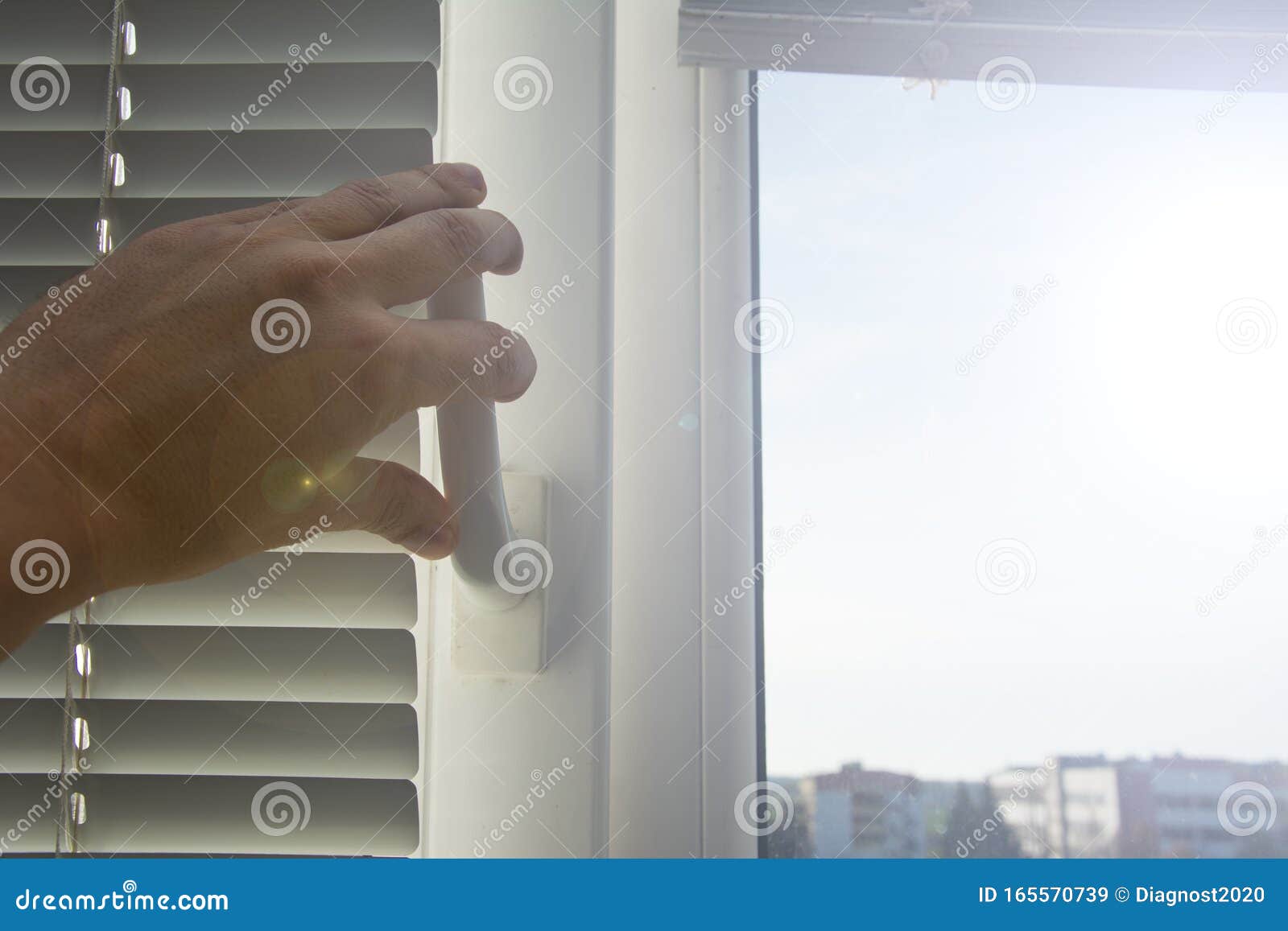 A Young Man Closes Or Opens Window With Lowered Horizontal White ... Open Window At Morning