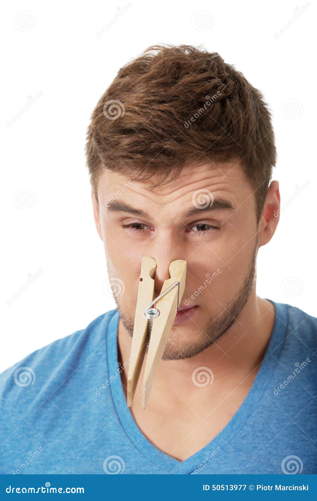 Young Man With Clothespin On His Nose. Stock Photo Image 50513977
